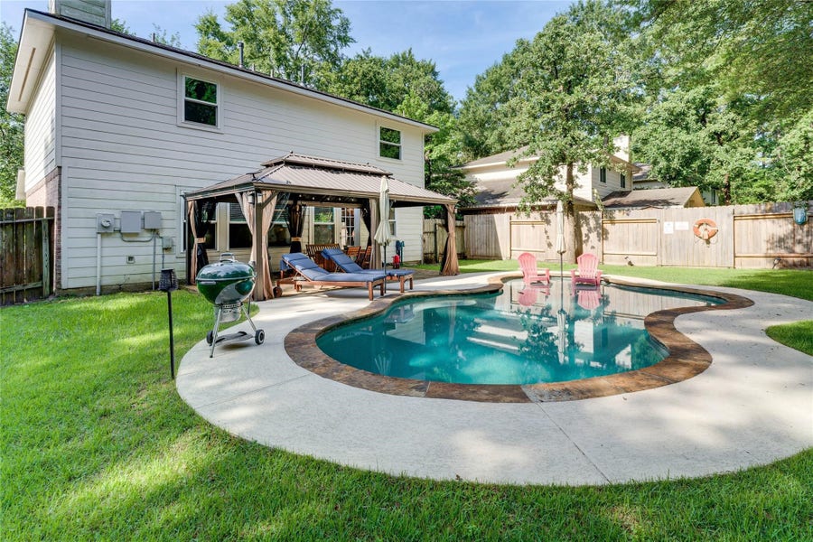 Property photo for 34 Steep Trail Place, Conroe, TX
