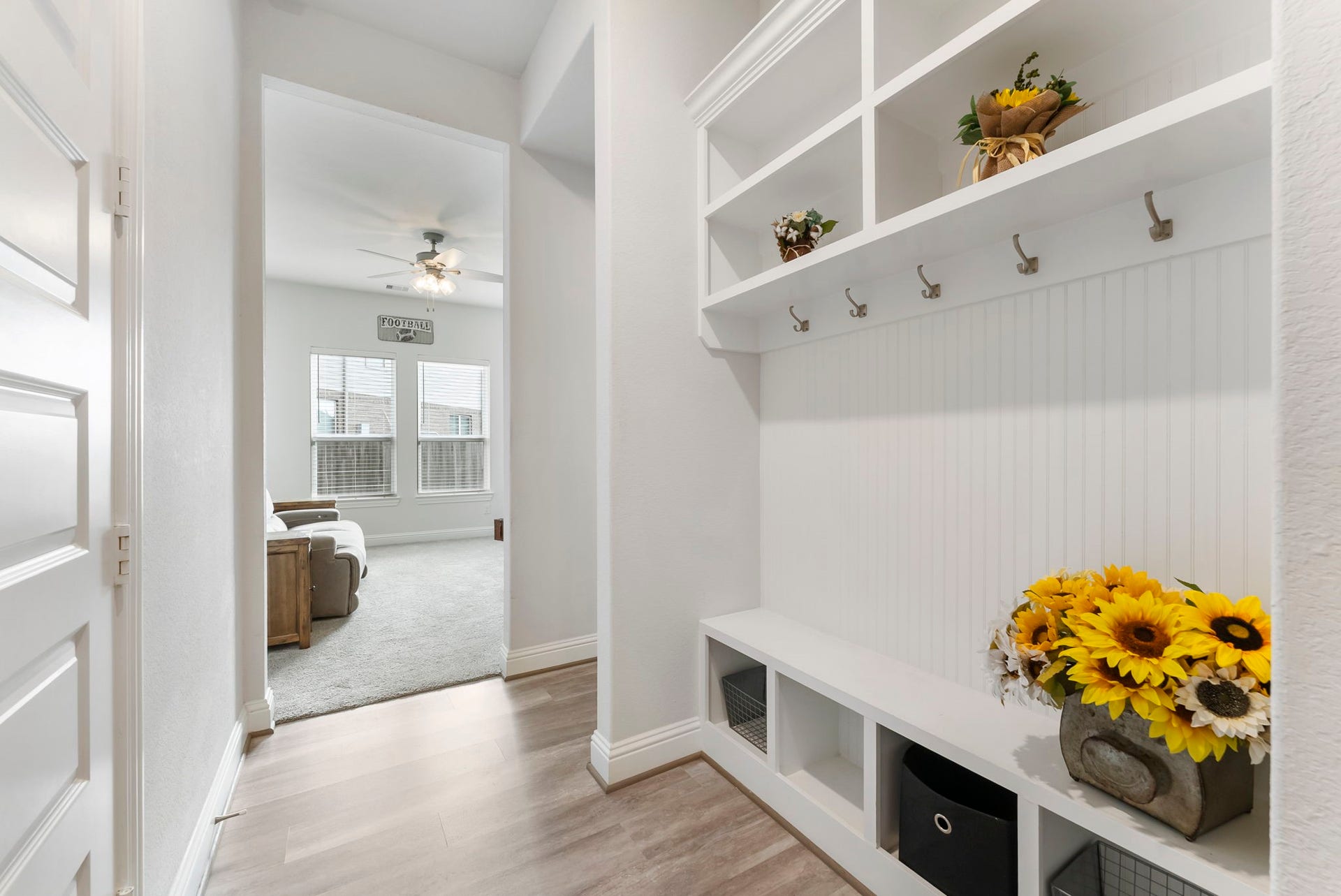 24307 Winter Lakes Drive, Katy, TX 77493 Mudroom located just inside the garage entrance, with a flex room and half bath down the hall