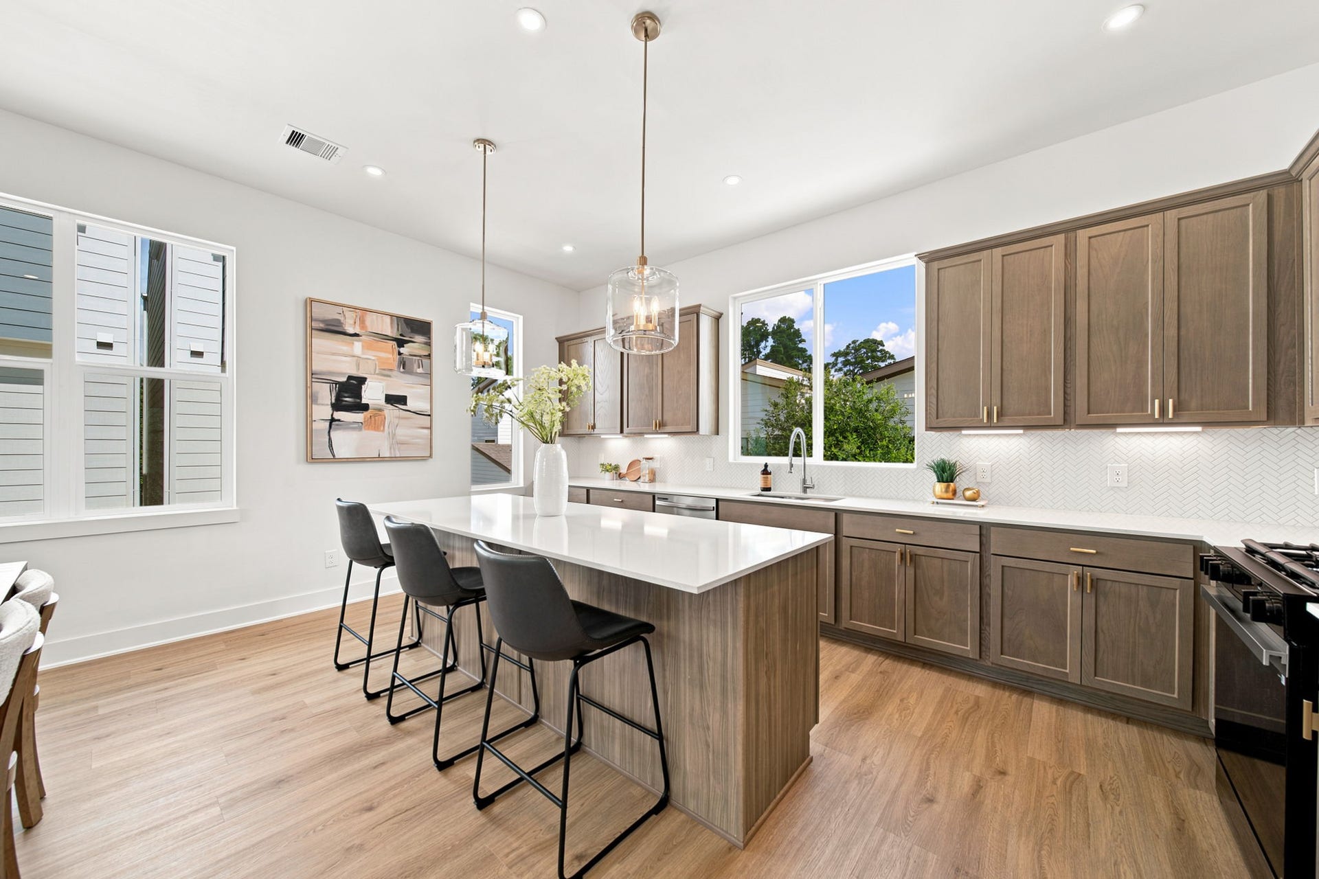 1648 W Tidwell Road, Houston, TX 77091 Kitchen upper and lower cabinets are high quality.