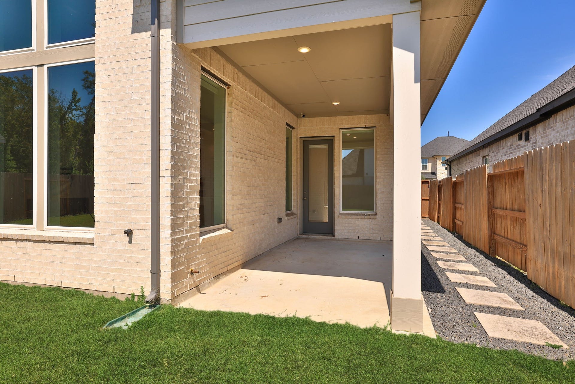 9211 Fury Landing Lane, Tomball, TX 77375 Covered porch is relaxing and convenient to the living area for outdoor activities