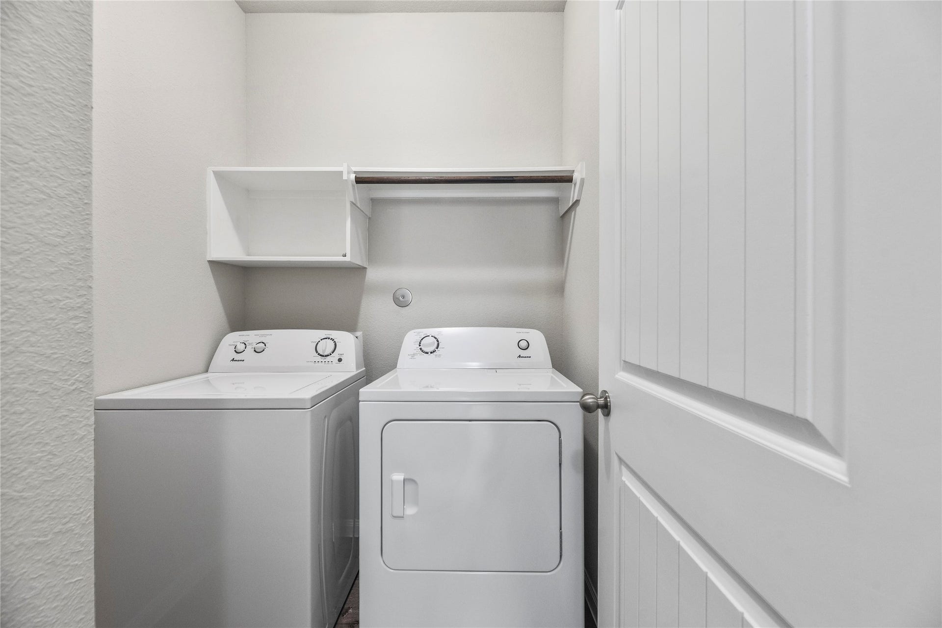 2276 Raider Drive, Conroe, TX 77301 1st floor utility room, washer and dryer included.