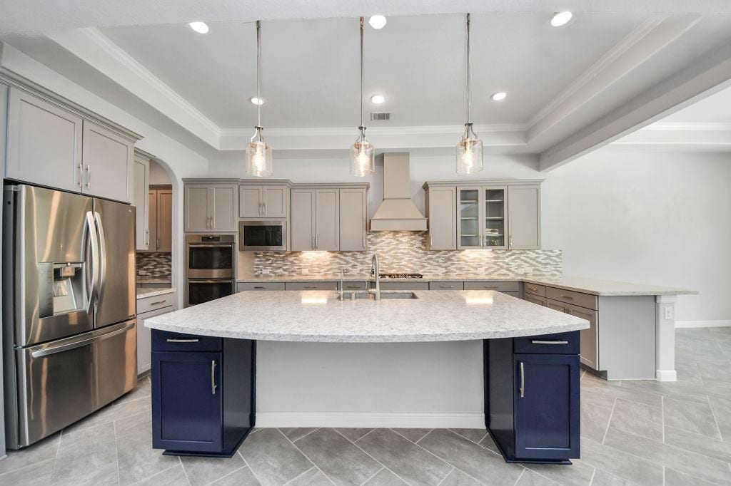4035 Ashland Woods Drive, Spring, TX 77386 Huge island /breakfast bar offers additional casual seating.