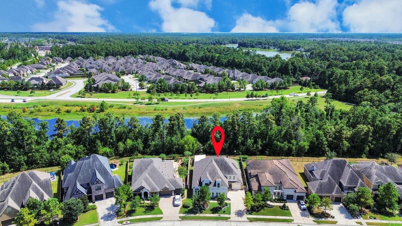 4035 Ashland Woods Drive, Spring, TX 77386 Look at this gorgeous greenbelt and pond behind the home!