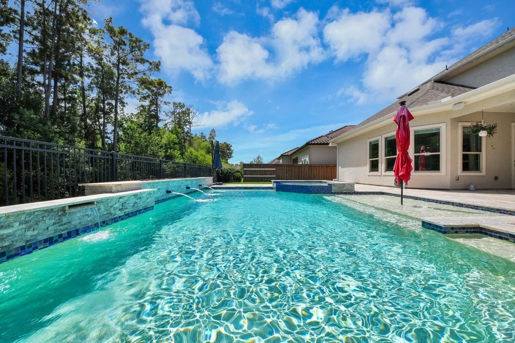 4035 Ashland Woods Drive, Spring, TX 77386 The pool features are operated remotely with an app on your phone.