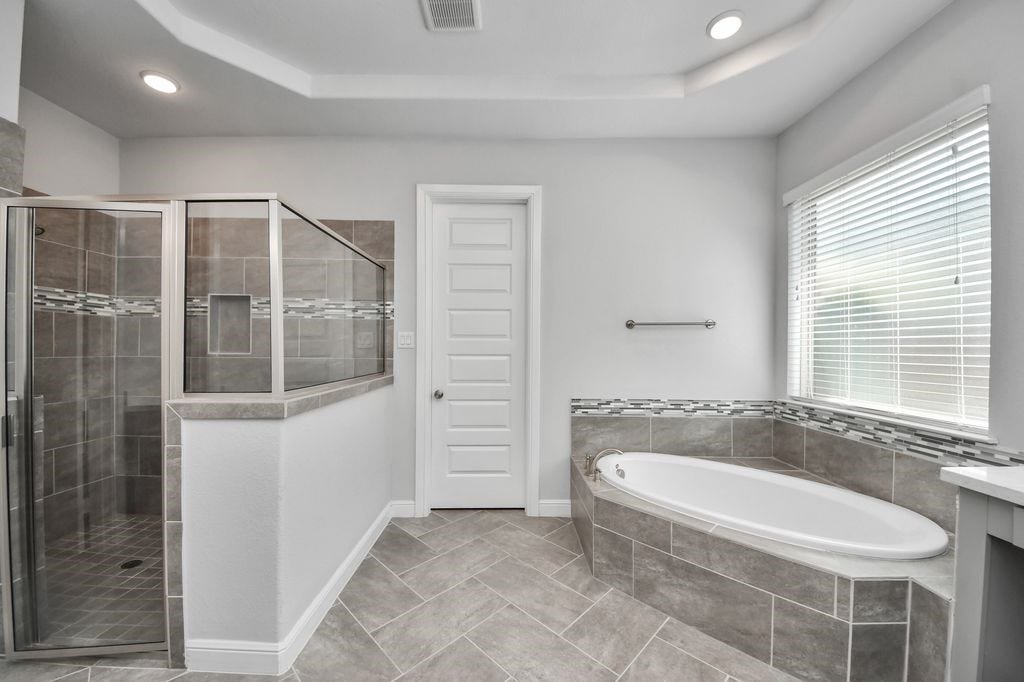 4035 Ashland Woods Drive, Spring, TX 77386 The shower has a built-in bench!
