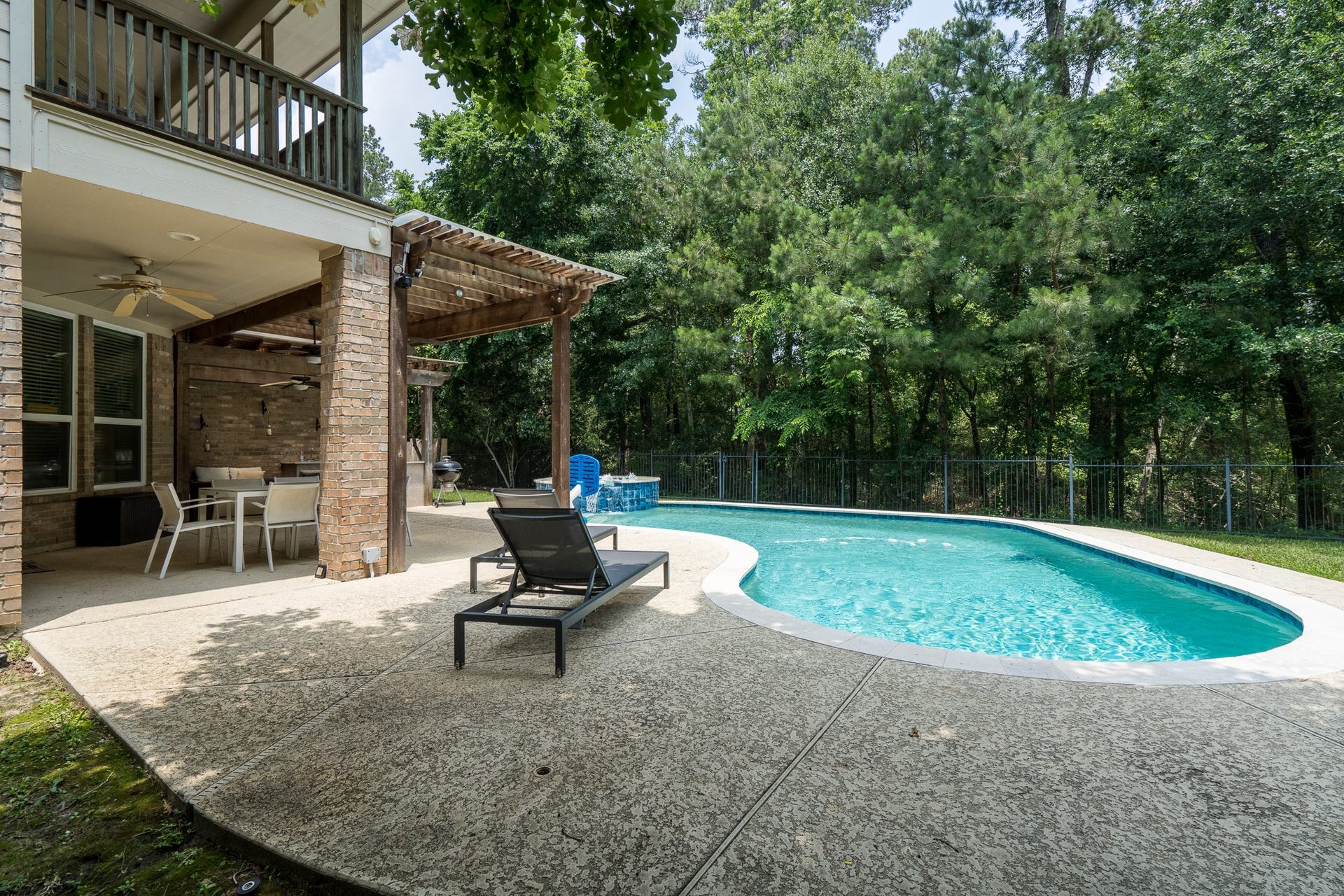 11 Dahlia Trail Place, The Woodlands, TX 77382 Pool View