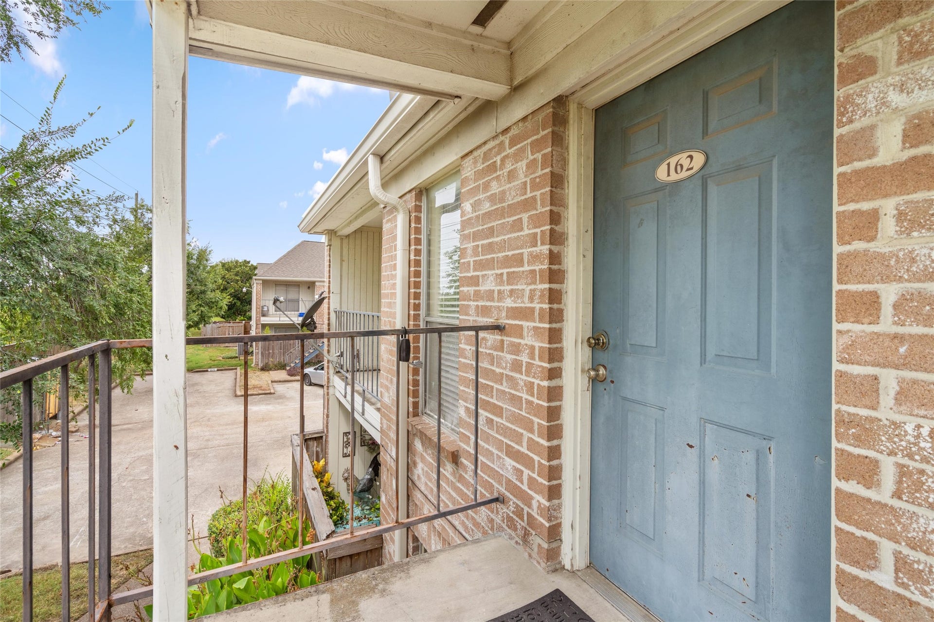 3900 Woodchase Drive, #162, Houston, TX 77042 Upstairs, corner unit on the first building on left, facing beautiful, wooded Greenbelt.