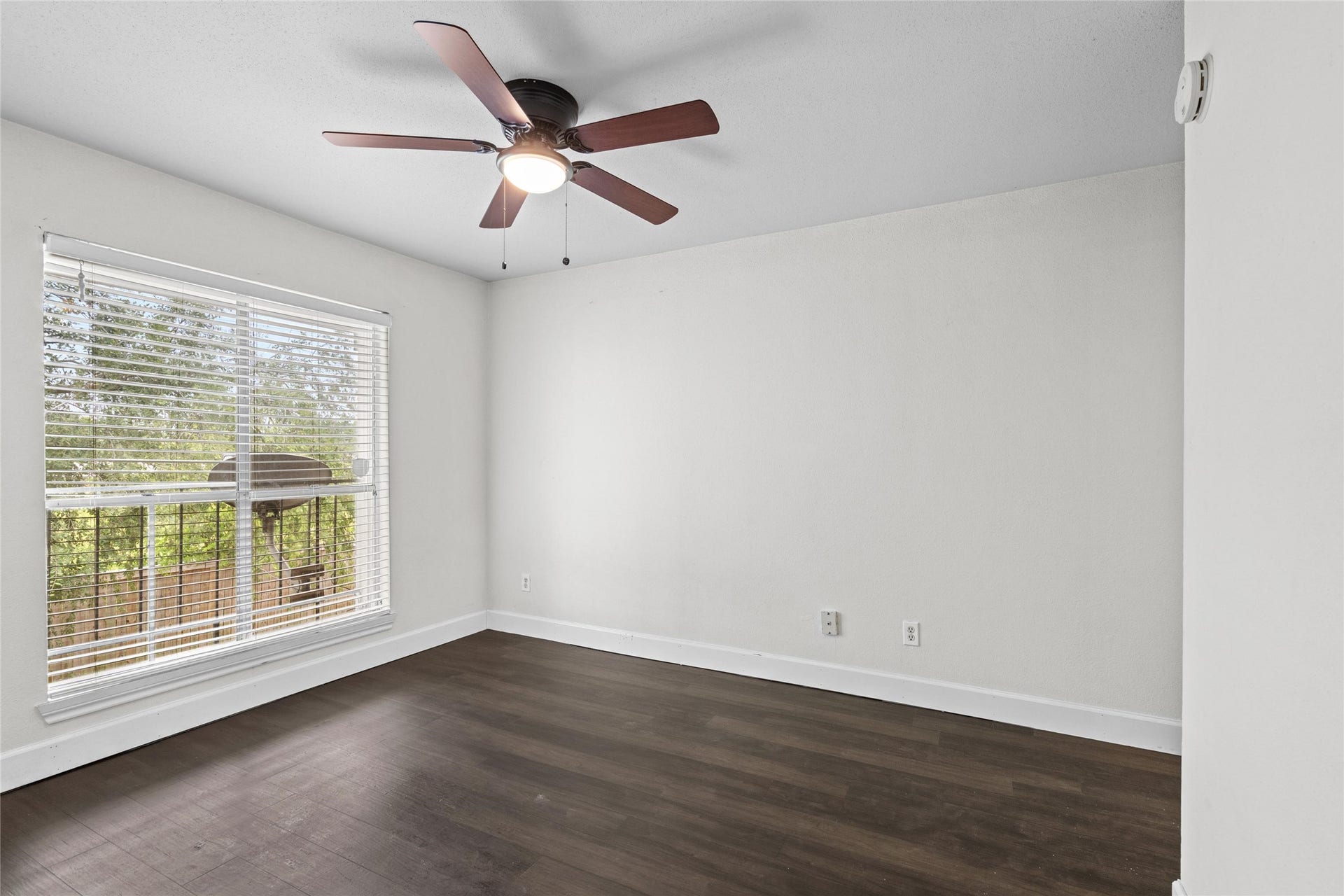 3900 Woodchase Drive, #162, Houston, TX 77042 Bedroom provides convenient access to the closet area while maintaining an open, functional layout.