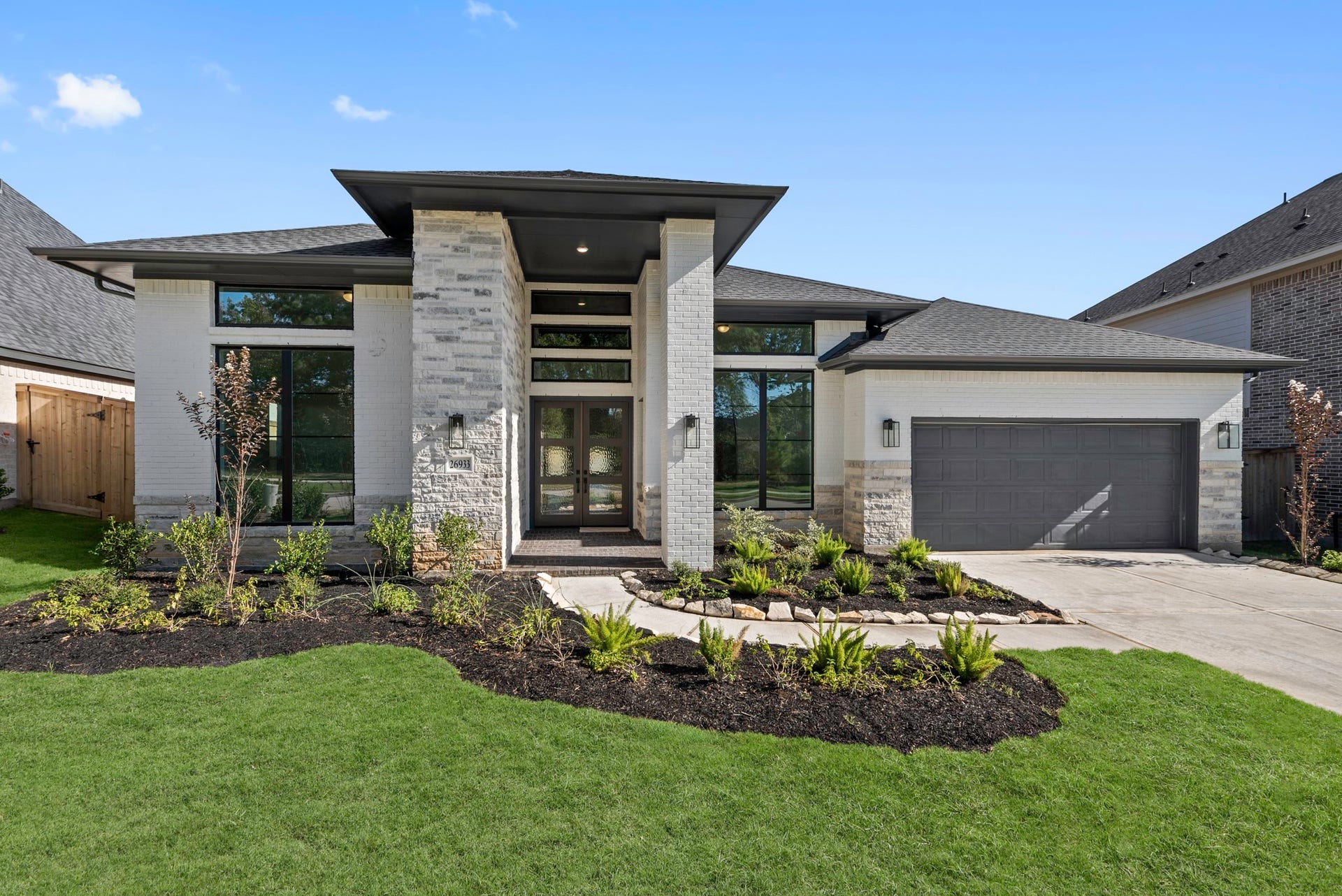 26933 South Ranch House Road, Montgomery, TX 77316 Move-In Ready! Westin Homes | Lorraine IX New Construction. Grass is digitally enhanced.