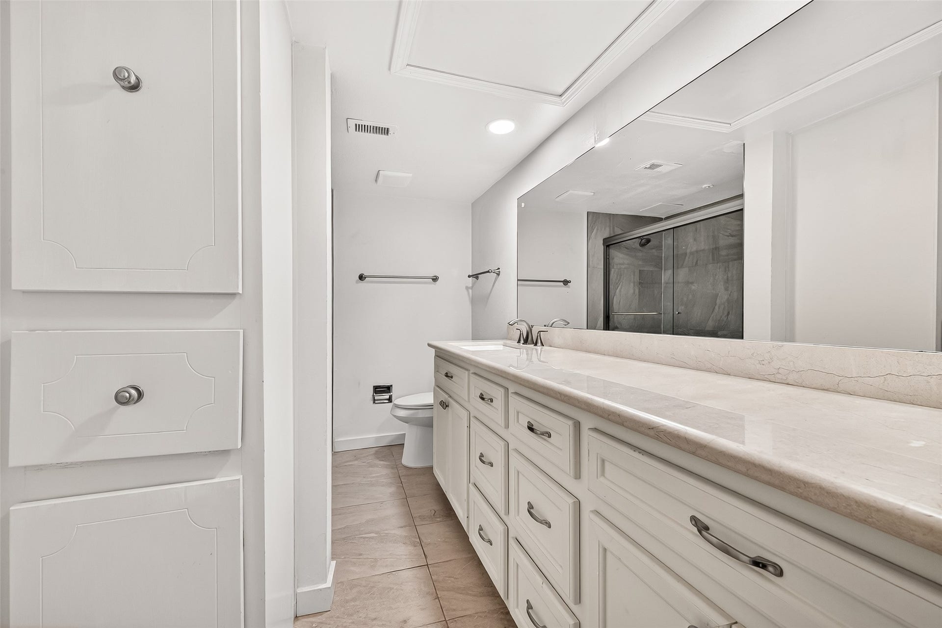 359 N Post Oak Lane, #127, Houston, TX 77024 Massive Walk In Closet Is Connected. Sink Vanity And Built In Gives Space And Organization.