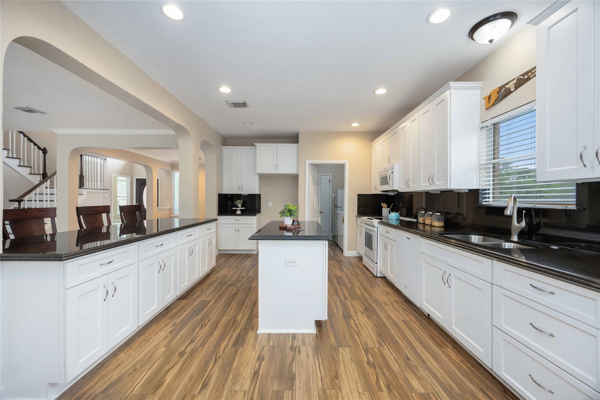 5498 Appleblossom Lane, Friendswood, TX 77546 Look at all these cabinets. This kitchen is made for you! There is enough room for all your entertaining needs.
