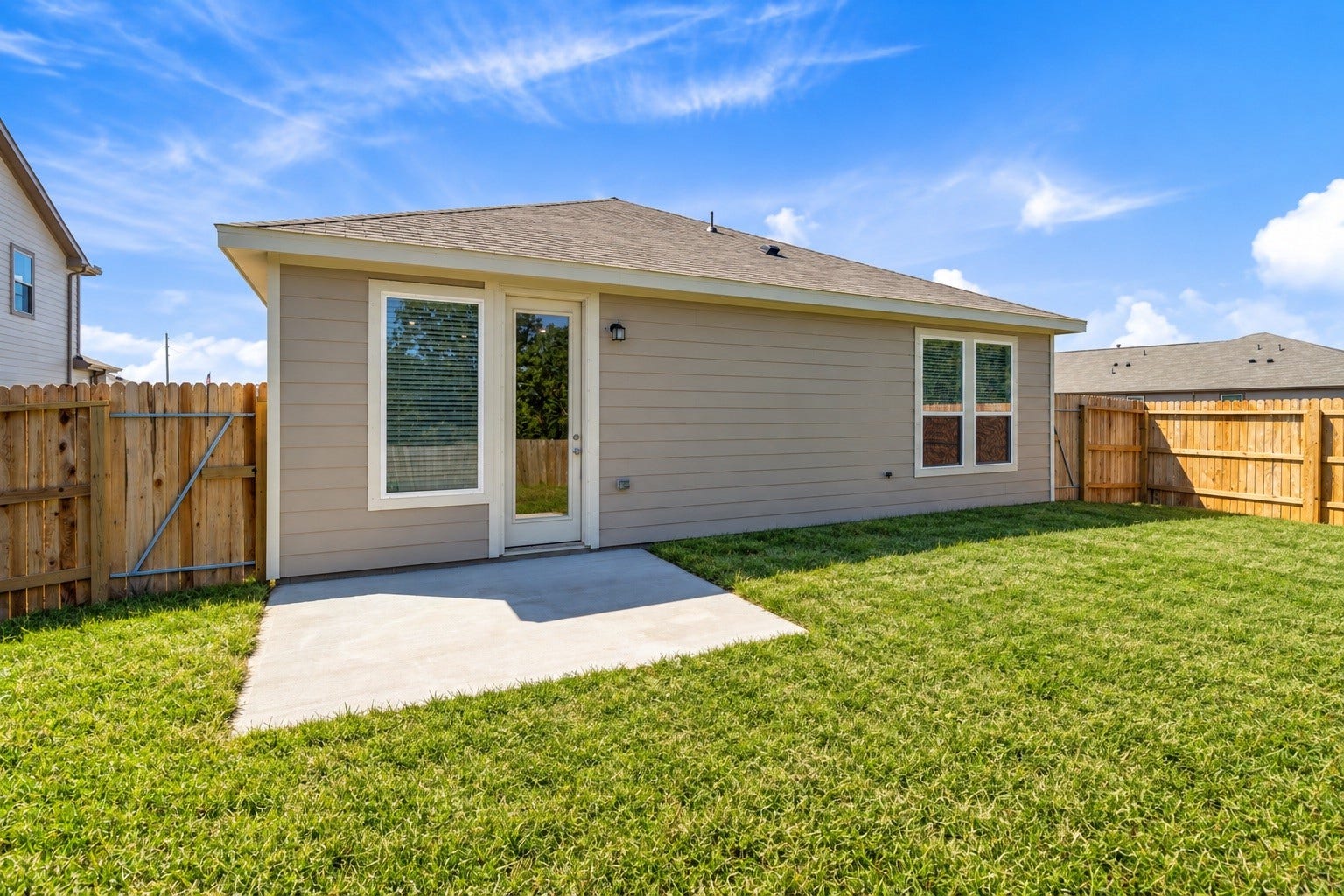 5619 Blackbird Lane, Hitchcock, TX 77563 Come explore this generous backyard with large patio slabperfect for kids to play freely and adults to unwind in comfort!
