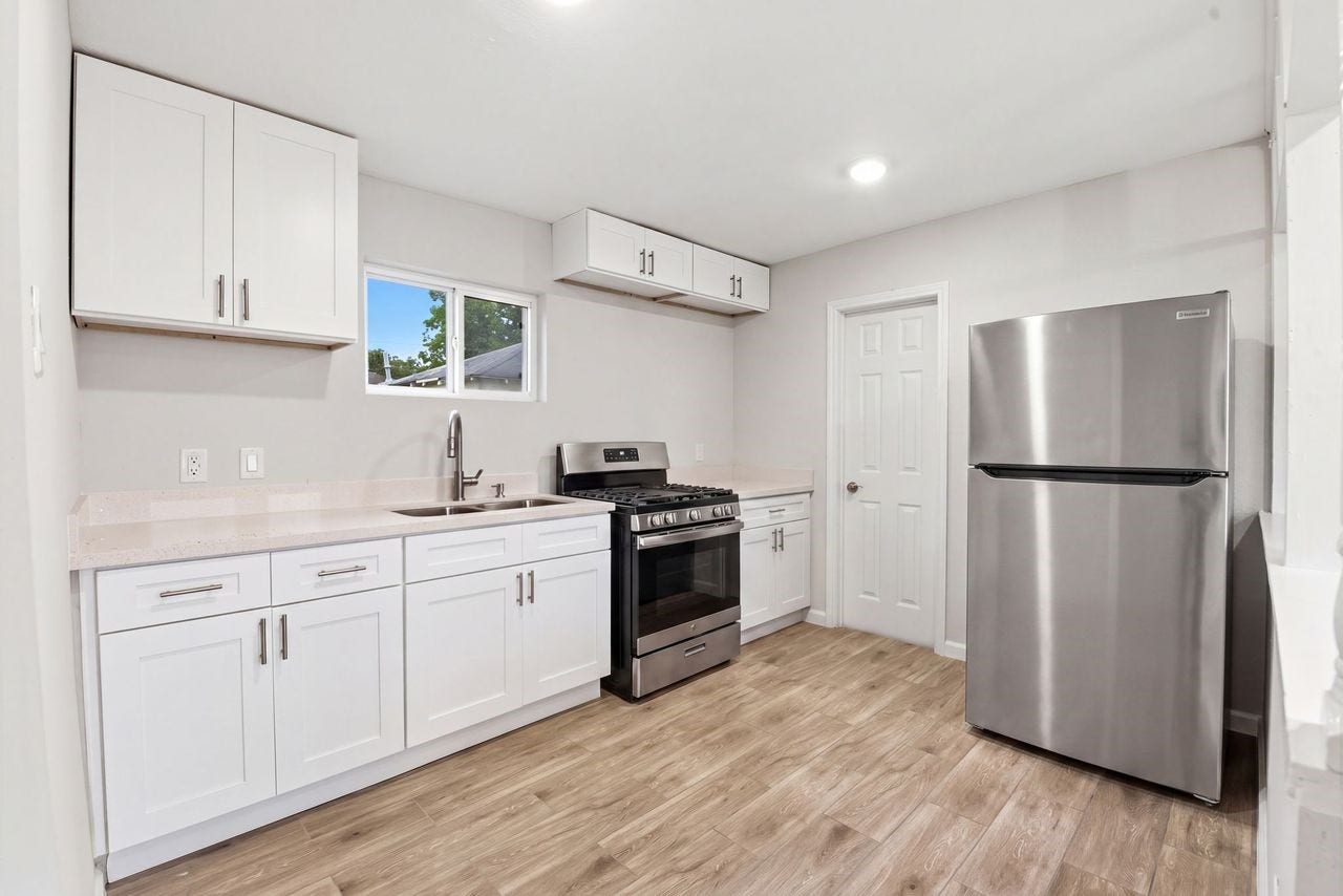 7010 Brownsville Street, #3, Houston, TX 77020 The unit includes a refrigerator and stove.