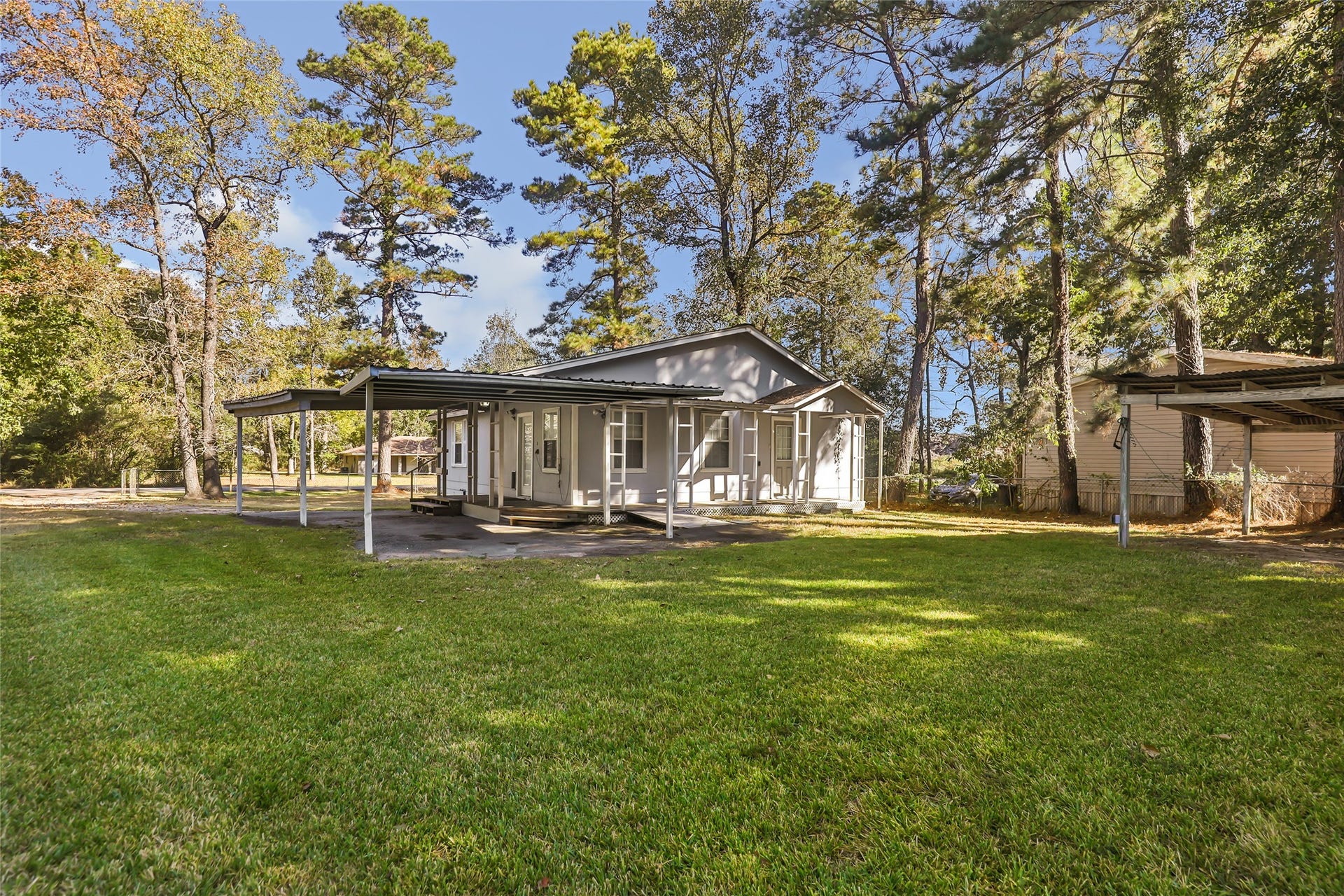 23304 E Community Drive, New Caney, TX 77357 Enjoy approximately 0.31 acres with mature trees, open yard space and room to spread out. No HOA and no deed restrictions offer added flexibility!