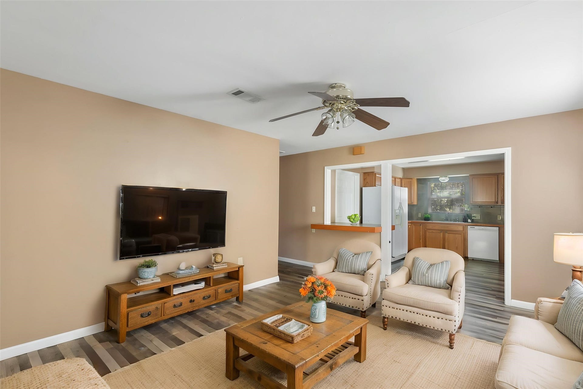 23304 E Community Drive, New Caney, TX 77357 Functional living space with convenient access to the adjoining rooms. (This photo is virtually staged.)