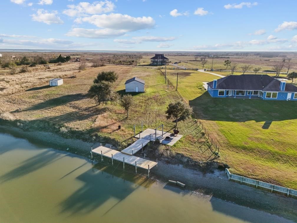 9850 S Redfish Drive, Hitchcock, TX 77563 Enjoy the recently added dock !