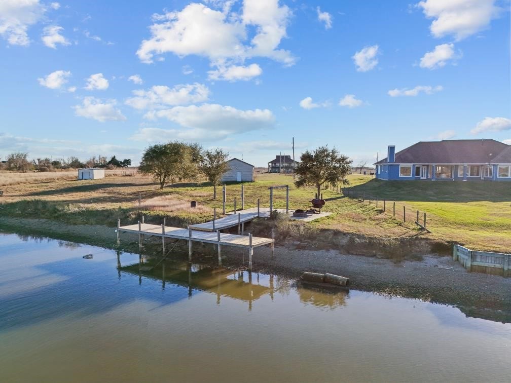 9850 S Redfish Drive, Hitchcock, TX 77563 Great spot to drop your fishing lines, crab pots!