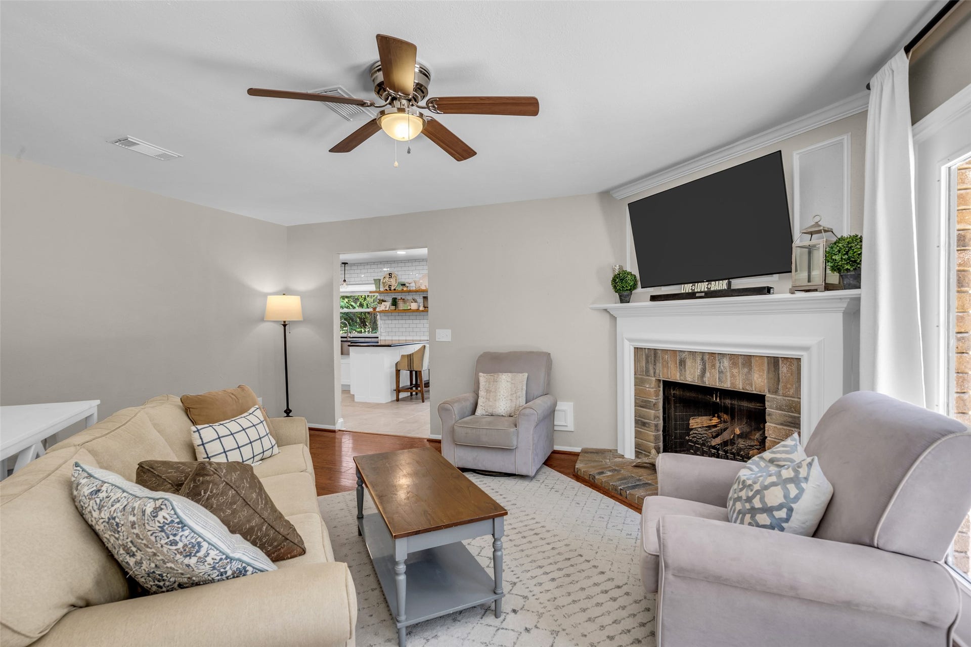 2 Tall Sky Place, The Woodlands, TX 77381 Spacious Living Room with corner fireplace