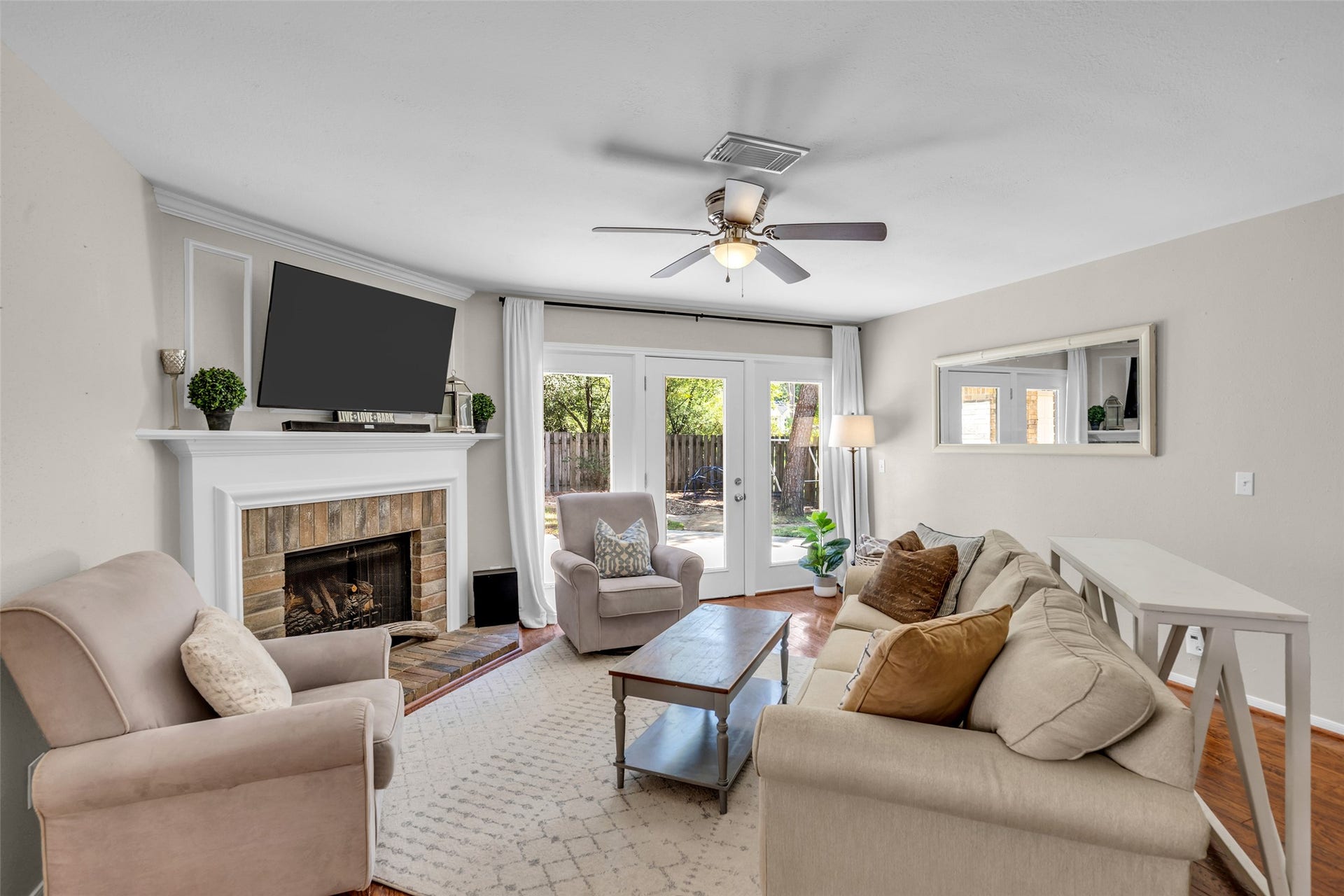 2 Tall Sky Place, The Woodlands, TX 77381 Spacious Living Room with corner fireplace
