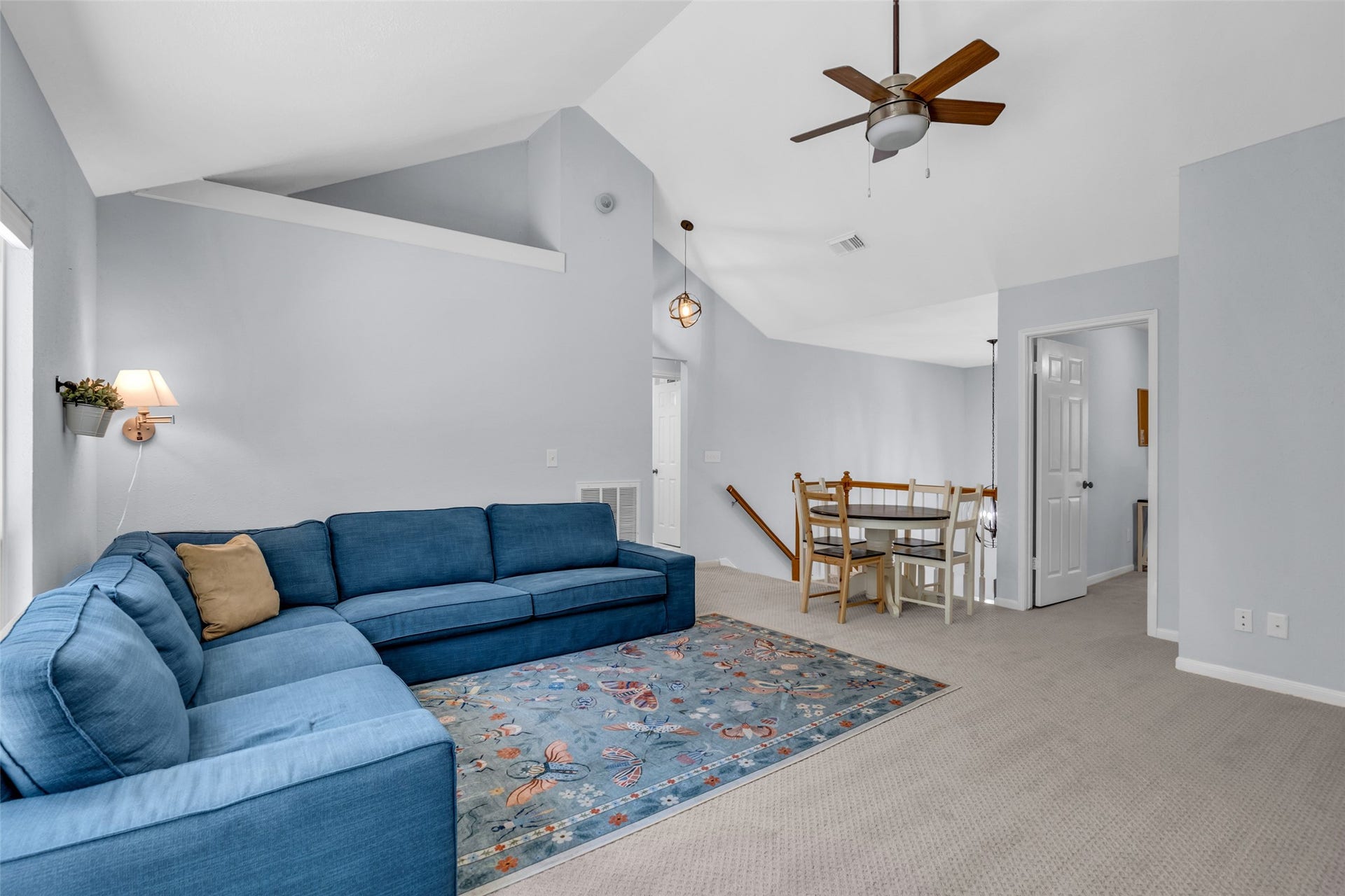 2 Tall Sky Place, The Woodlands, TX 77381 Upstairs game room with custom bookshelves
