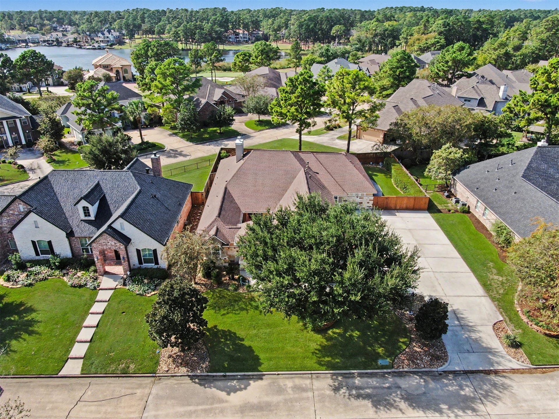 124 Wycliffe Drive, Montgomery, TX 77356 Beautiful aerial view showcasing the home's desirable setting and established neighborhood.