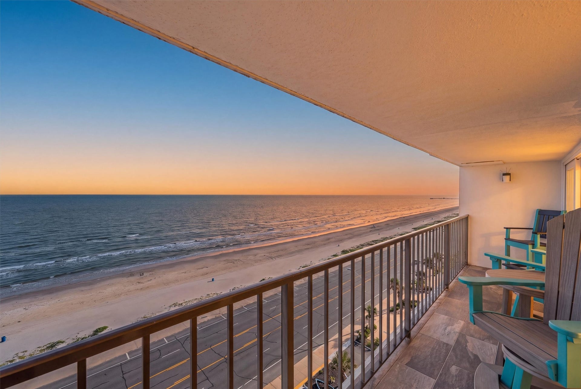 7310 Seawall Boulevard, #1105, Galveston, TX 77551 Stunning beachfront balcony offering panoramic ocean views, perfect for enjoying serene sunsets and the soothing sound of waves.