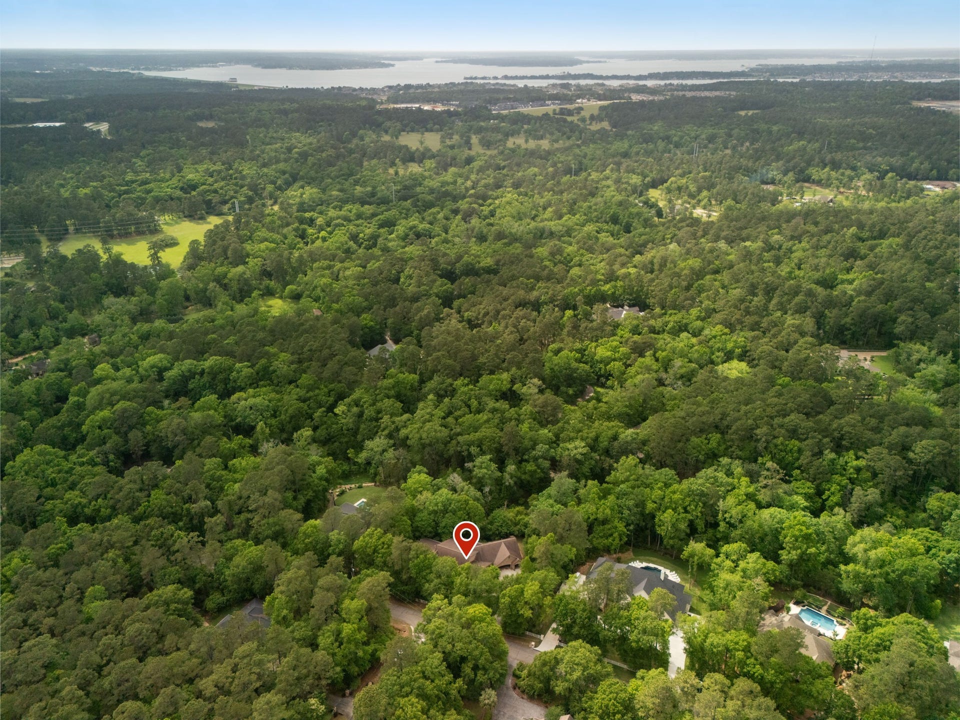 7421 Enchanted Stream Drive, Conroe, TX 77304 Escape to this private property while still staying minutes from I-45, Lake Conroe, and all the necessary amenities.