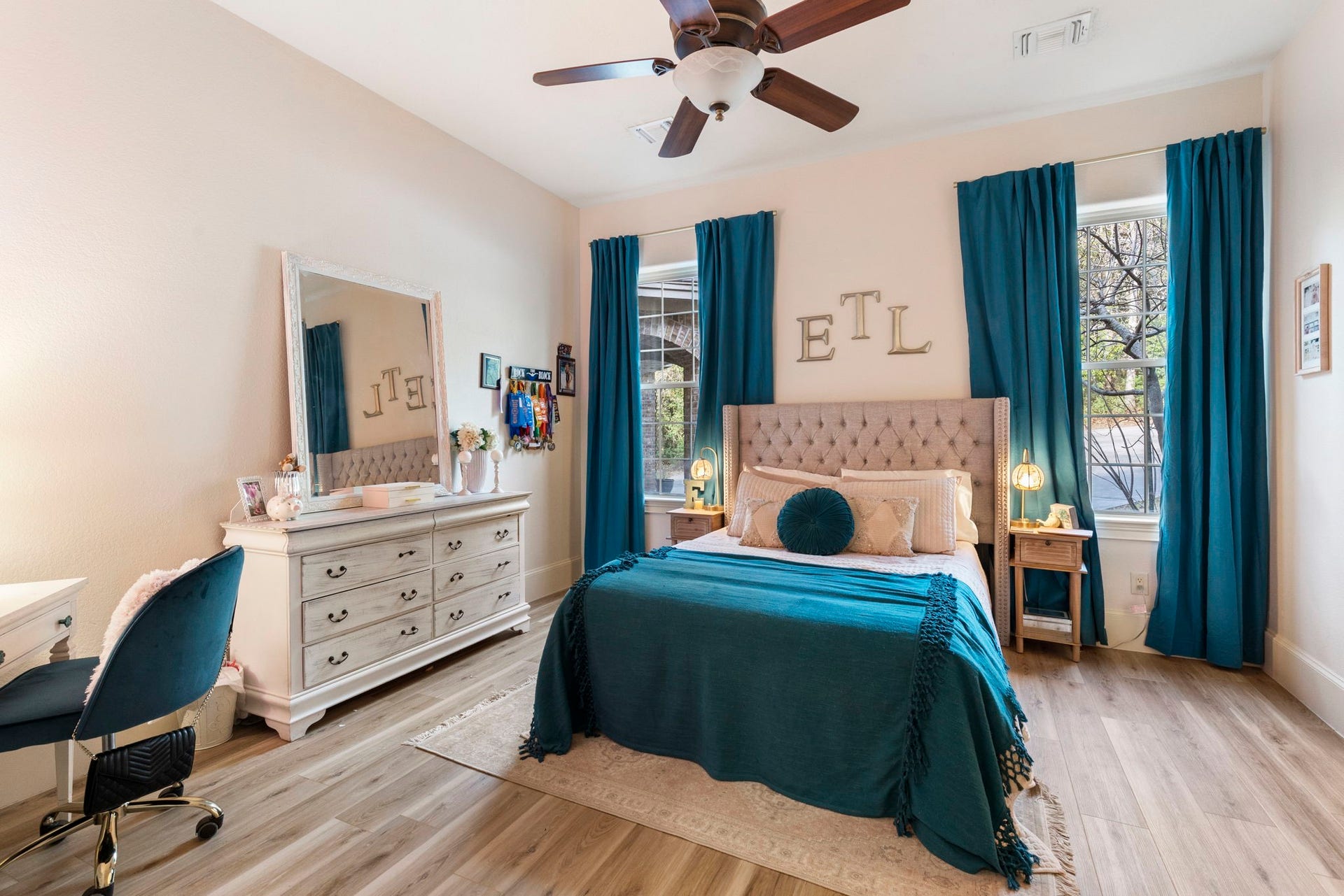 7421 Enchanted Stream Drive, Conroe, TX 77304 All secondary bedrooms have high ceilings and ceiling fans.