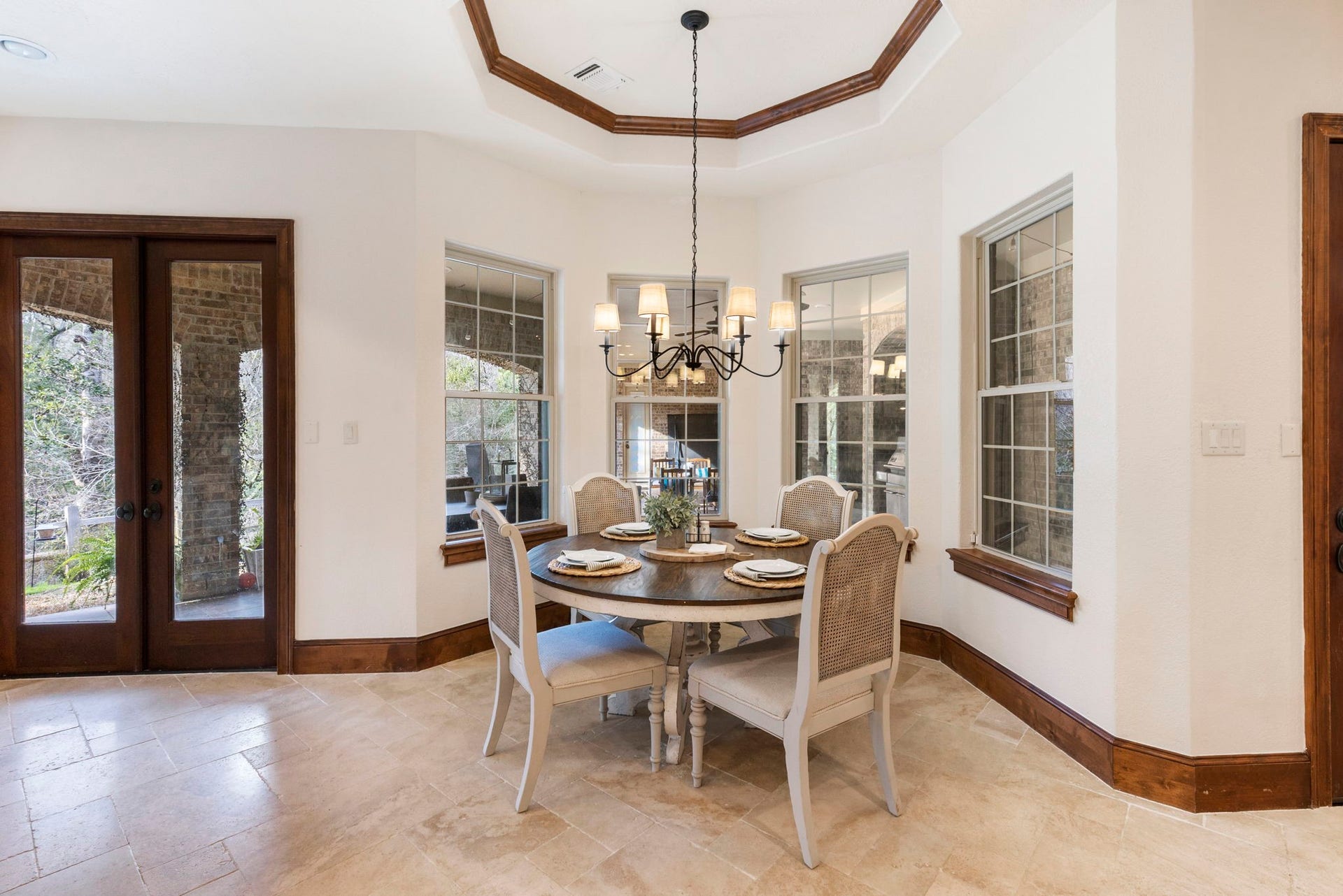 7421 Enchanted Stream Drive, Conroe, TX 77304 Light and bright this bay window breakfast area is the perfect place for a quick meal and gives some of the best nature views!