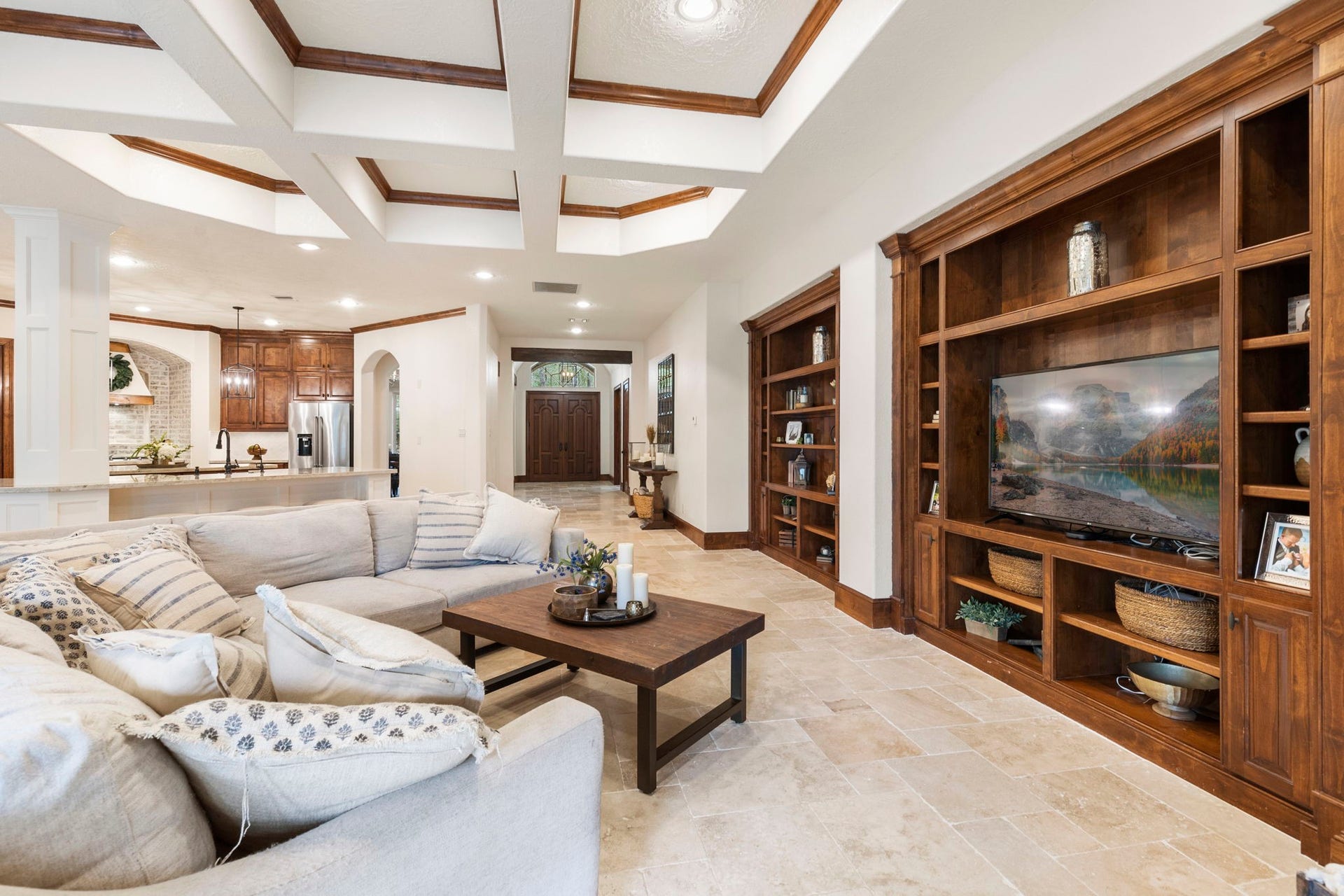 7421 Enchanted Stream Drive, Conroe, TX 77304 Travertine floors, rich built-ins, neutral paint and so much charm.