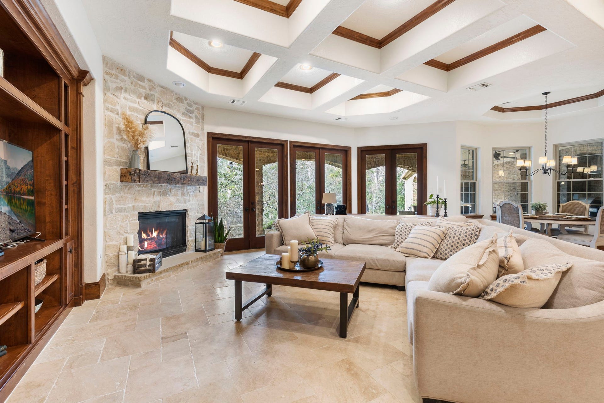 7421 Enchanted Stream Drive, Conroe, TX 77304 Sure to be the gathering place of the home this oversized den is full of bells and whistles!