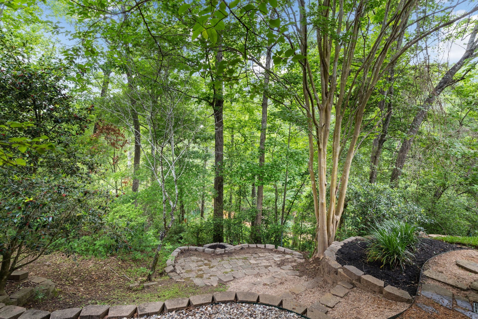 7421 Enchanted Stream Drive, Conroe, TX 77304 Your own piece of nature-filled heaven truly providing a private escape to the woods all quietly nestled in a gated community just minutes from I-45! Endless mature trees and manicured walk-ways from all sides of this 1+ acre expansive + private lot!