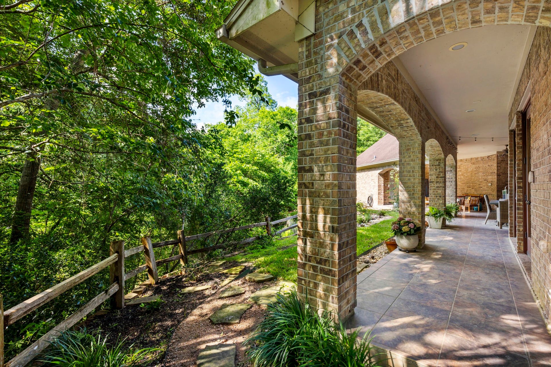 7421 Enchanted Stream Drive, Conroe, TX 77304 Epic views from every angle! Expansive back patio with multiple sitting areas.