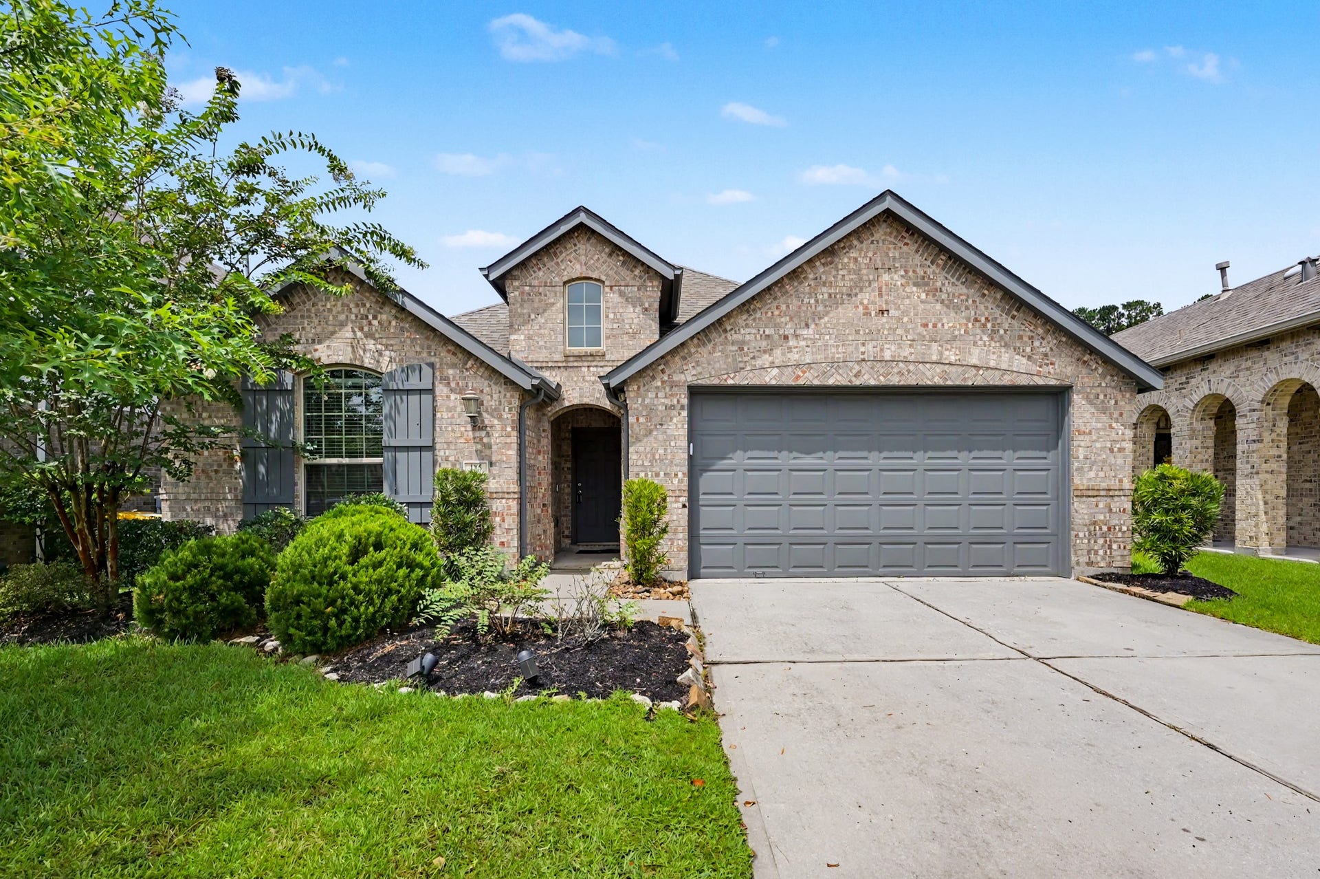 185 Emory Birch Drive, Montgomery, TX 77316 Welcome home to charming curb appeal with a welcoming entry and beautifully maintained exterior.