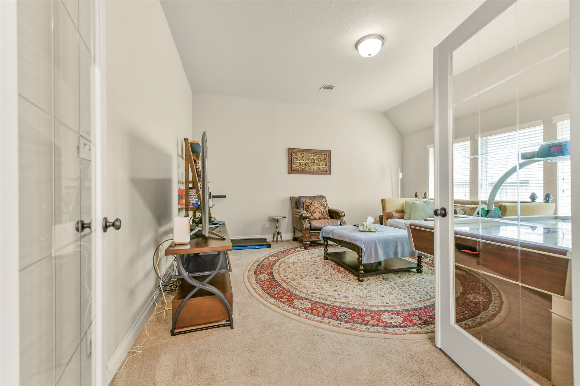 3011 Sunrise Run Lane, Pearland, TX 77584 Media room/office/game room is right off the breakfast room