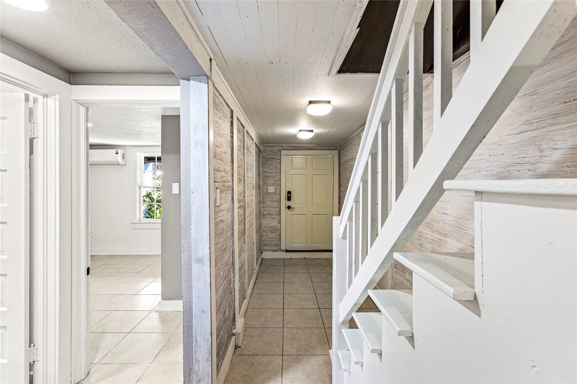 3902 Bernardo de Galvez, #1, Galveston, TX 77550 Hallway leading to smaller bedroom and utility area
