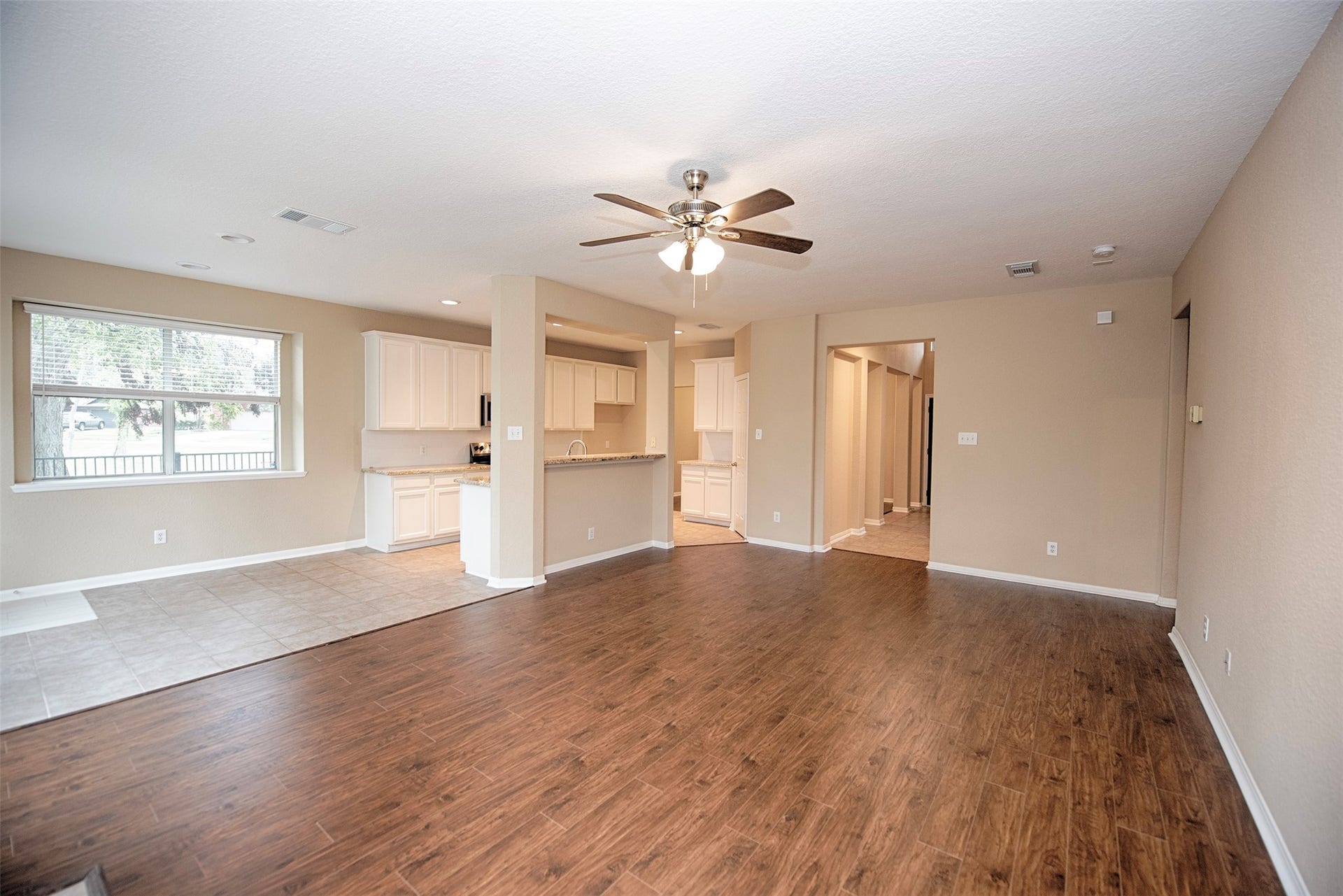 10411 Village Lake Drive, Missouri City, TX 77459 another view of the family room showing the fabulous space and gorgeous floors.