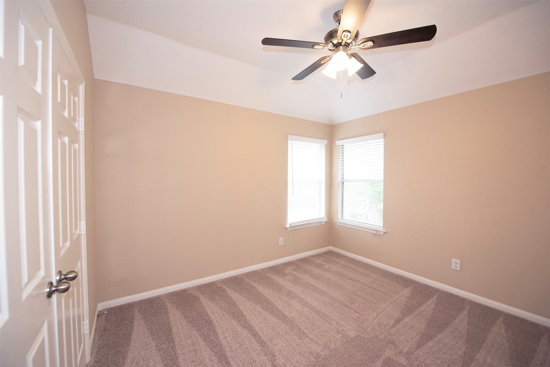 10411 Village Lake Drive, Missouri City, TX 77459 The fourth bedroom also facing the back and side of the home. The perfect size for one of the kids.