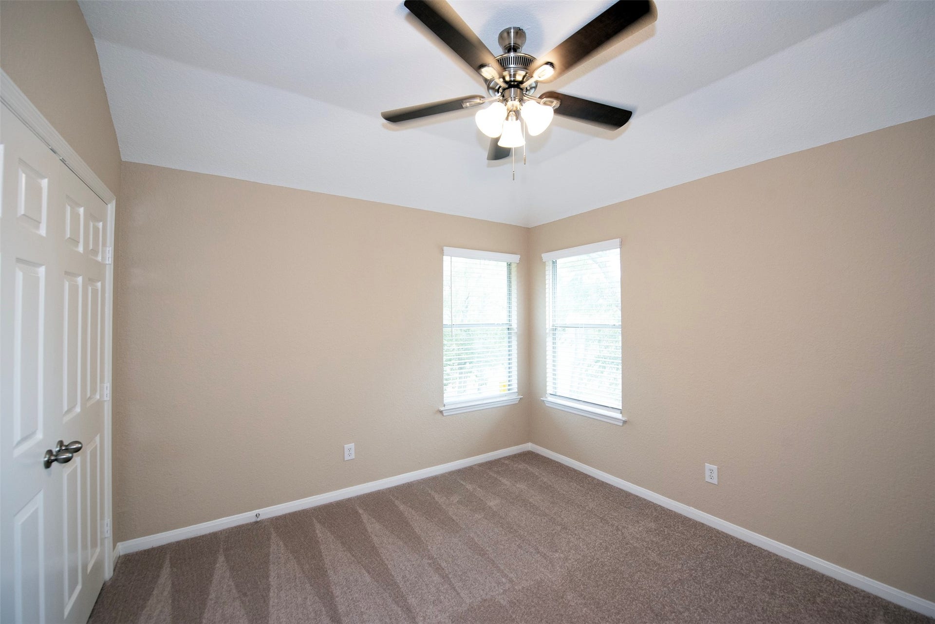 10411 Village Lake Drive, Missouri City, TX 77459 One of the additional bedrooms facing the back of the home with vaulted ceiling and terrific space.