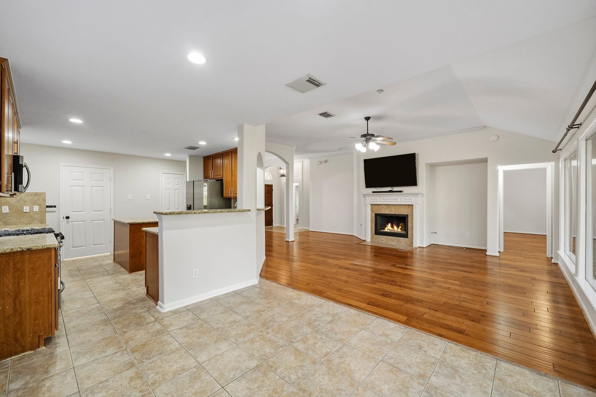 Kitchen seamlessly flows into the spacious family room, making it an entertainer's dream and perfect for the home chef to stay connected while cooking.