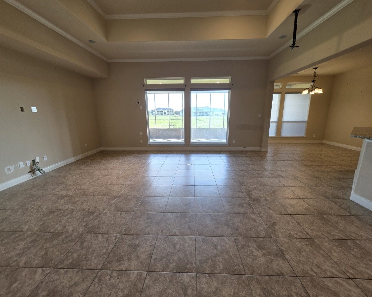 17111 Dewberry Lane, Rosharon, TX 77583 Spacious living room with tile flooring and a alcove ceiling