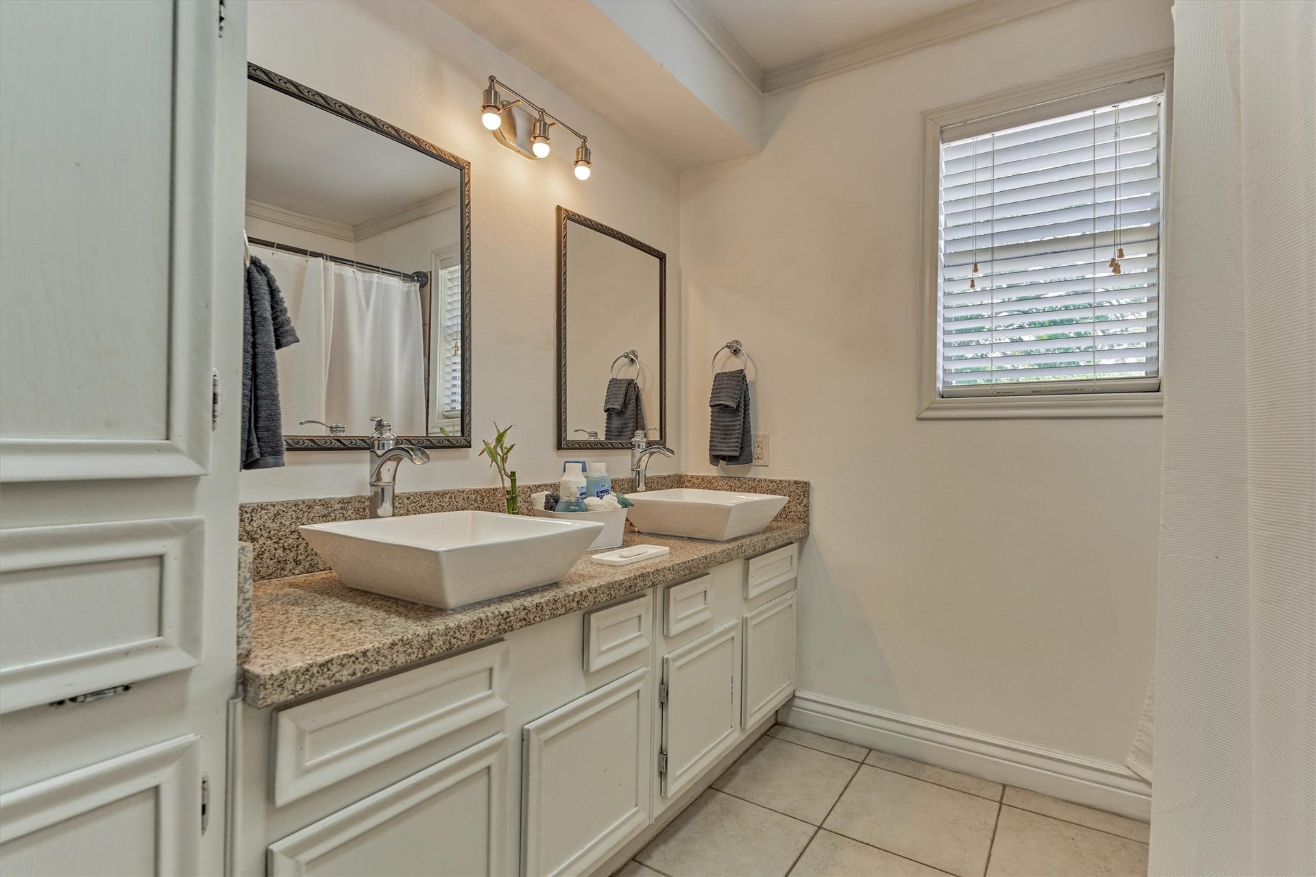 438 Lazy Lane, Montgomery, TX 77356 Note the double vanities and timeless updates.