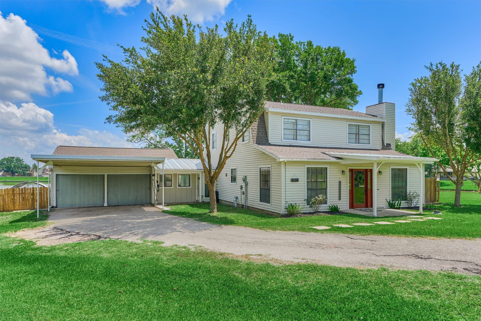 438 Lazy Lane, Montgomery, TX 77356 Returning to the front, the homes classic architecture and inviting curb appeal make a lasting first impression. Note the home offers a 2-car garage and a 2-car carport. And you can park your boat or RV right at home.