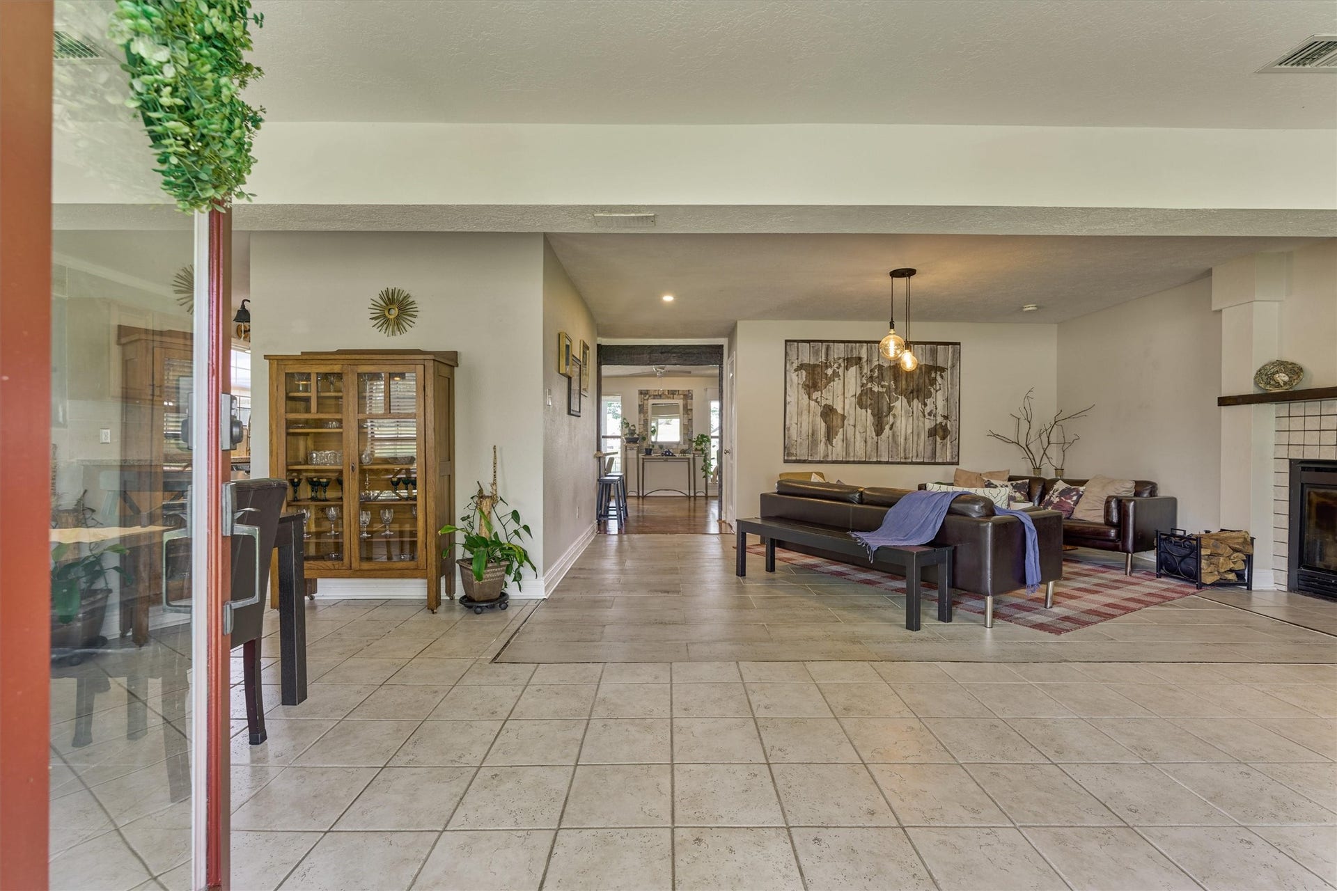 438 Lazy Lane, Montgomery, TX 77356 Step inside to discover a bright foyer that seamlessly connects the homes gathering and entertaining spaces.