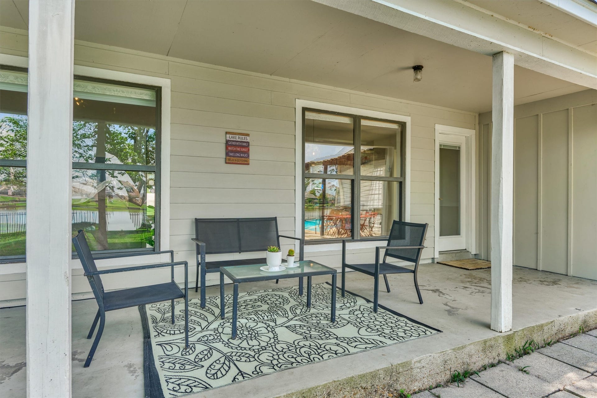 438 Lazy Lane, Montgomery, TX 77356 The covered back porch is right off the lkitchen for ease of serving and entertaining. This home is a must see!