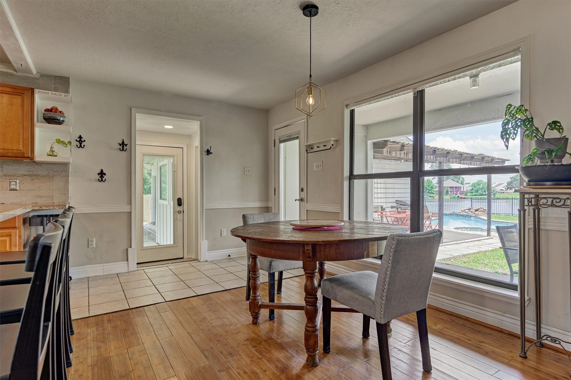 438 Lazy Lane, Montgomery, TX 77356 The breakfast area provides the perfect spot to start the day overlooking the backyard oasis.