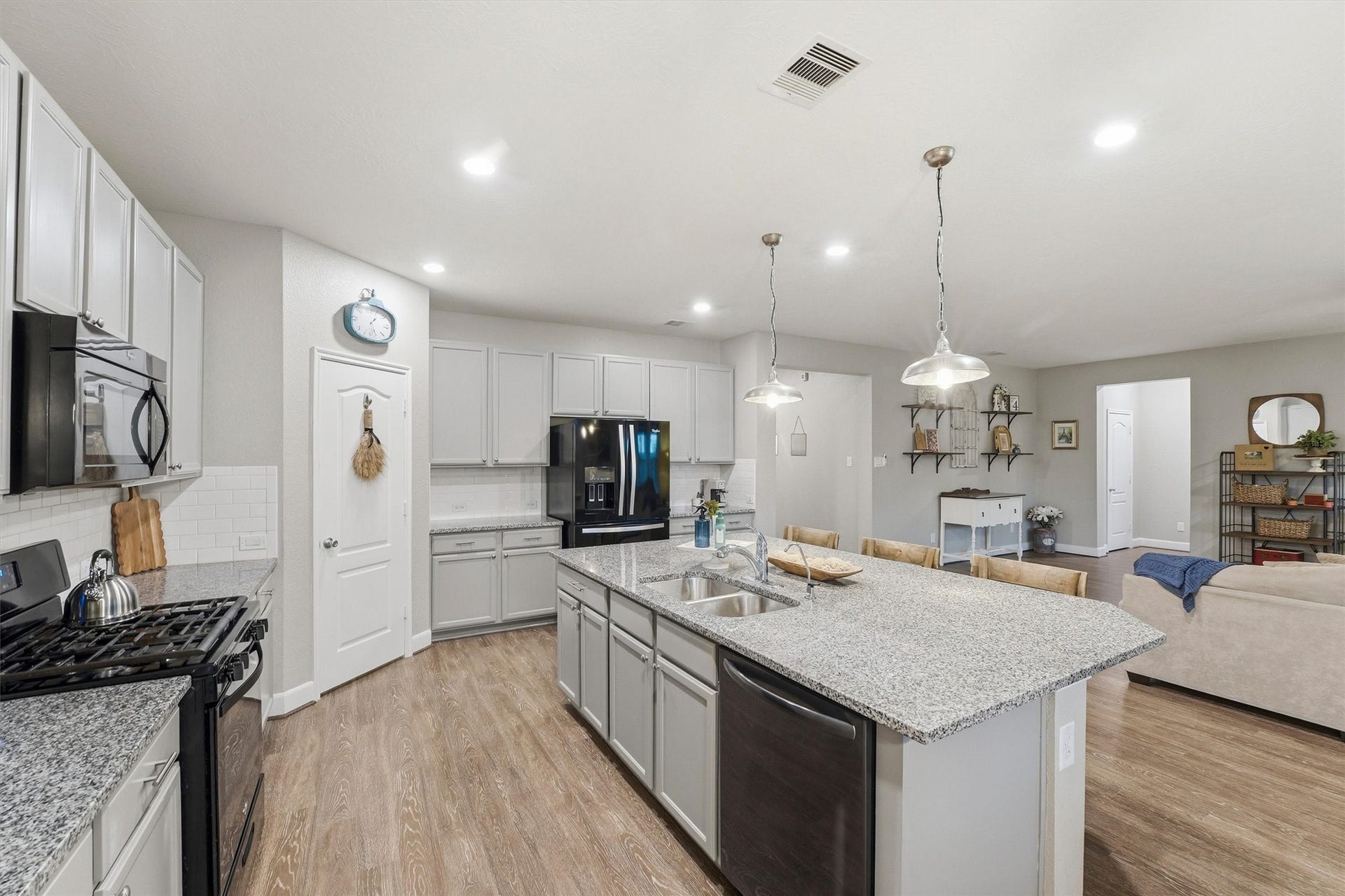 3502 Saxton Green Rd Road, Pearland, TX 77584 Kitchen view with walk-in corner pantry that has ample storage.