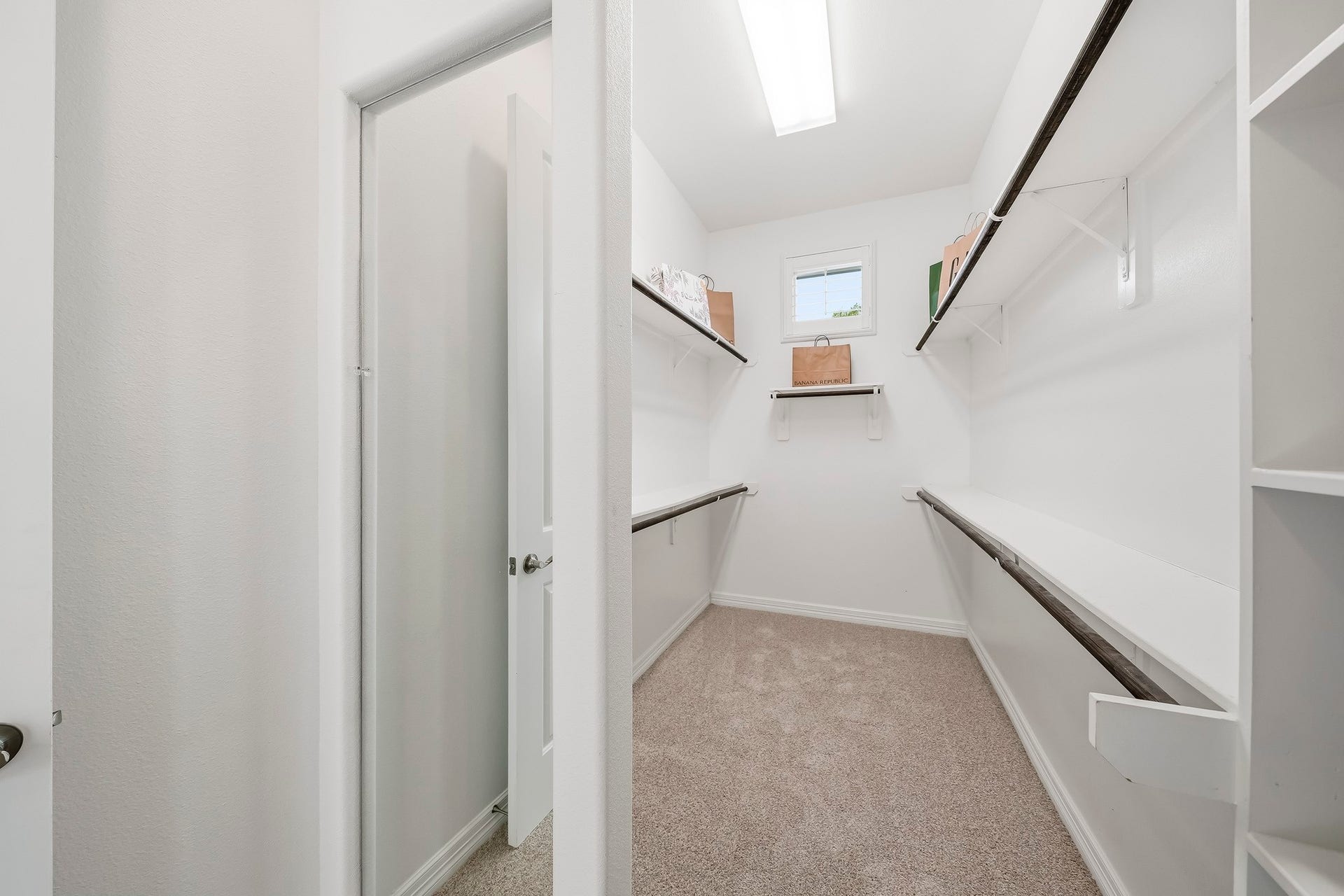 2nd walk in closet has Built in full length mirror...