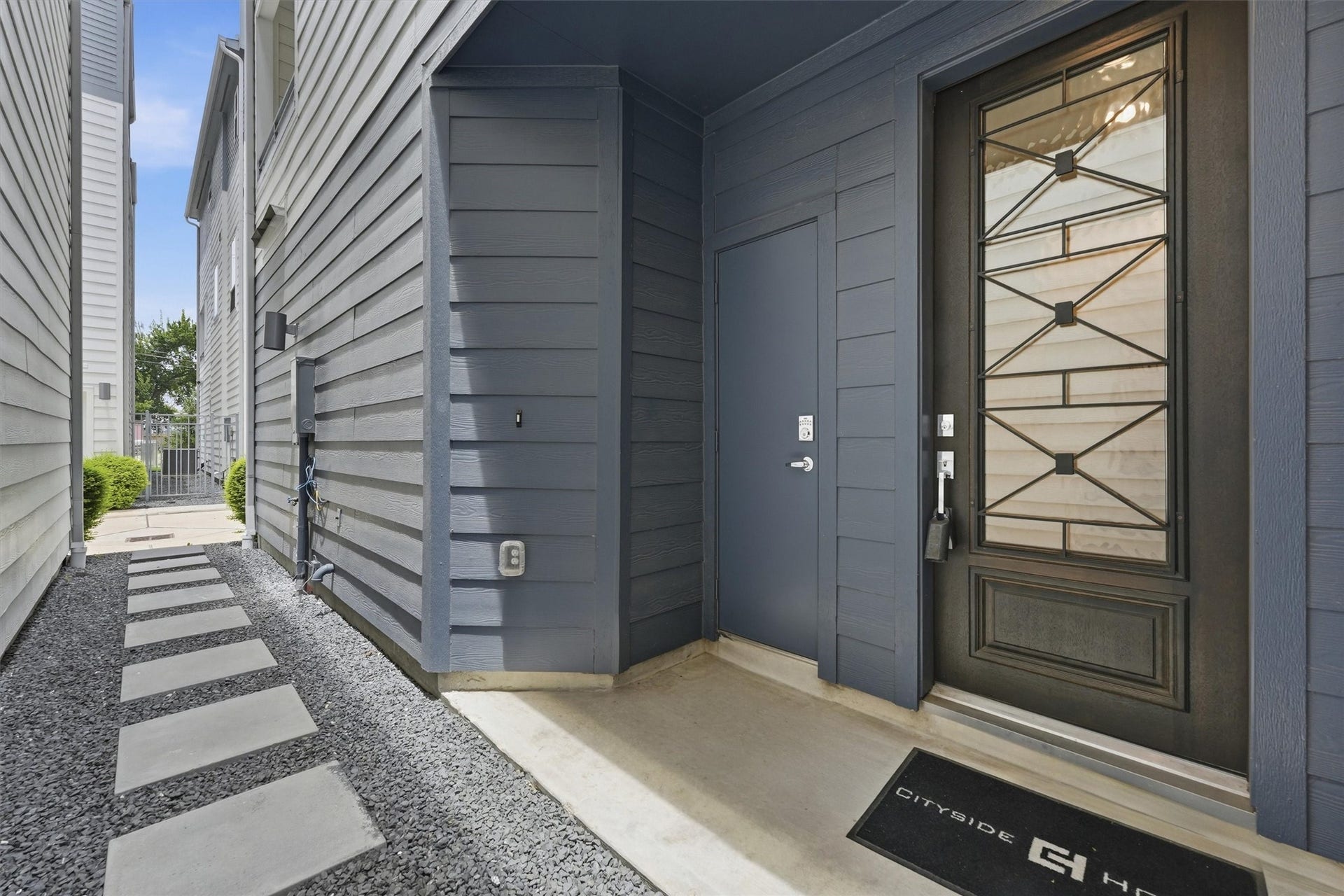 1804 Elysian Street, Houston, TX 77026 Enjoy the convenience of a private mailbox room right by your sleek, modern entrance, adding both style and security to your home.