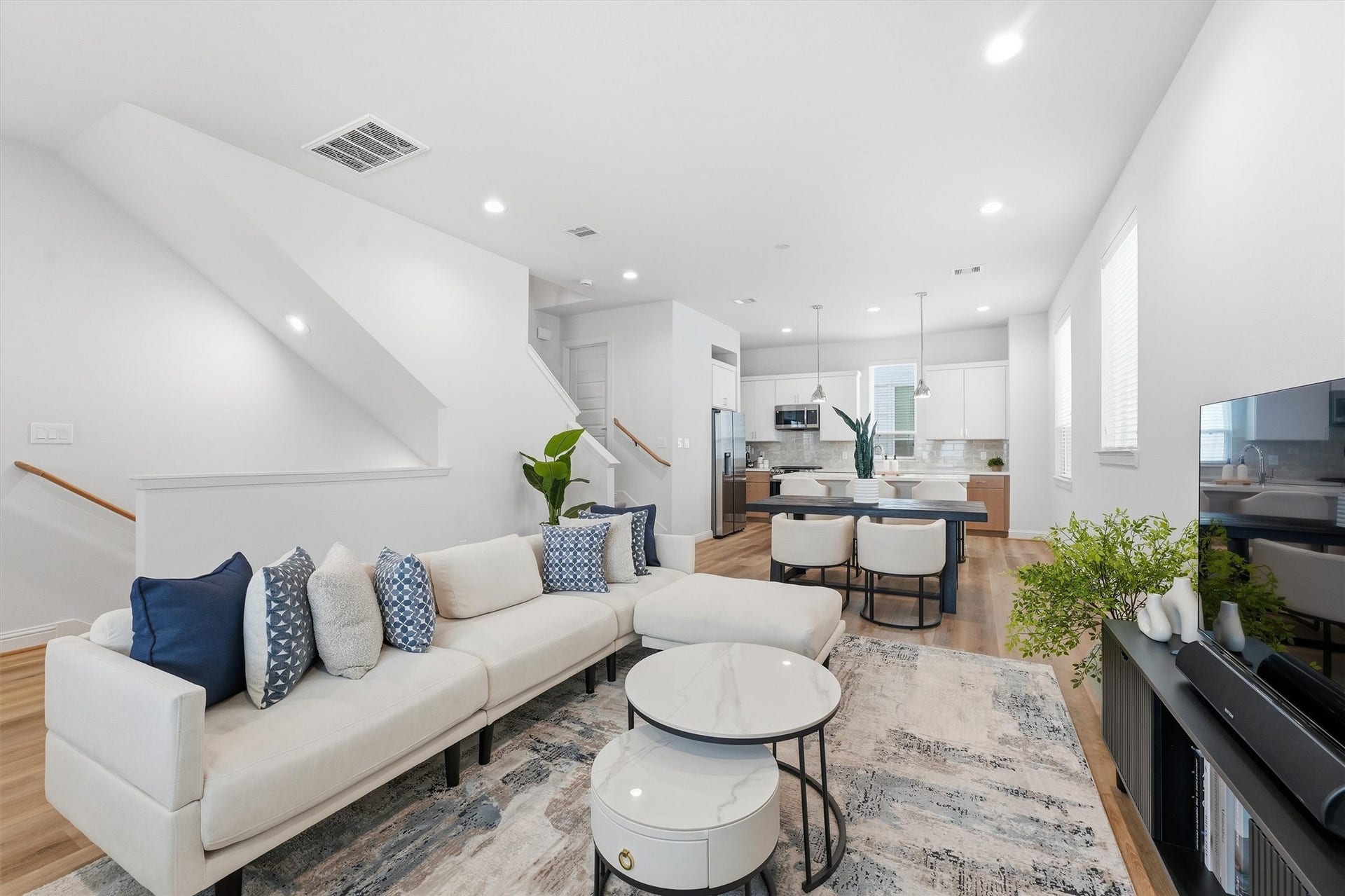 1804 Elysian Street, Houston, TX 77026 Discover seamless living in this bright, open-concept space where the living area flows into a stylish dining zone and sleek, modern kitchen.